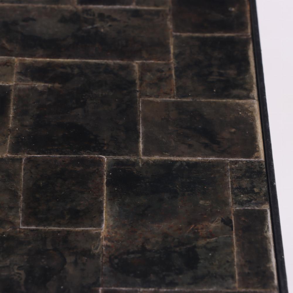 This elegant iron console table has a patchwork mica covered top supported by slender tapering wrought iron legs. Perfect for an entryway or behind a sofa.