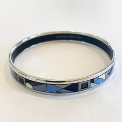 A Michaela Frey Austrian Geometric enamelled bangle in blue and black