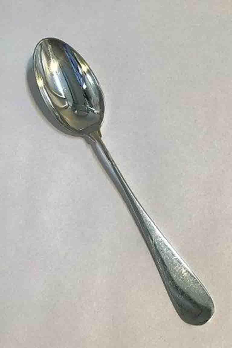 A. Michelsen Ida dessert spoon in sterling silver. 

Measures 18.8 cm / 7.40 in.
 