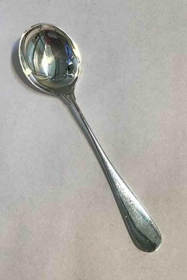 A. Michelsen Ida jam spoon in sterling silver. 

Measures 15 cm / 5.59 in.
 