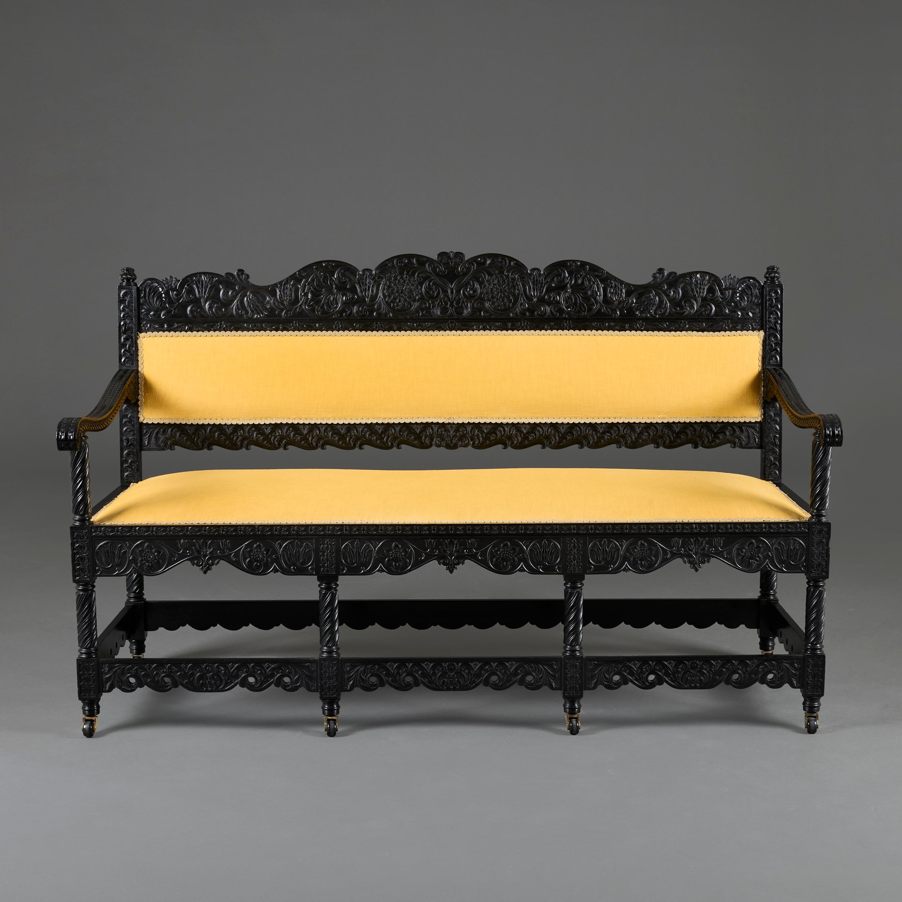 India, circa 1860

A fine mid nineteenth century ebonised sofa with foliate designs to the cresting, legs and rails, supported on barley twist legs terminating in castors, now upholstered in yellow linen. 

Total height 85.00cm

Seat height
