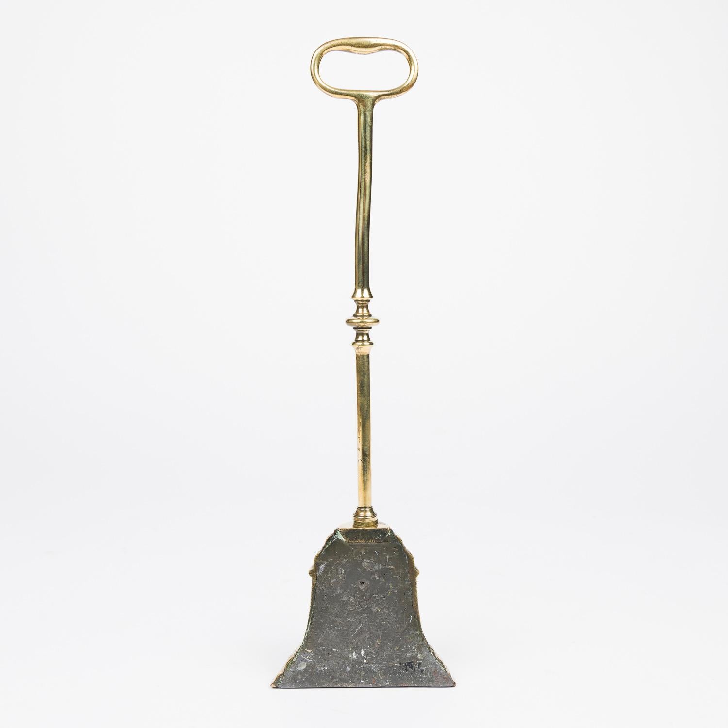 A mid 19th century brass bell shaped door stop For Sale 1