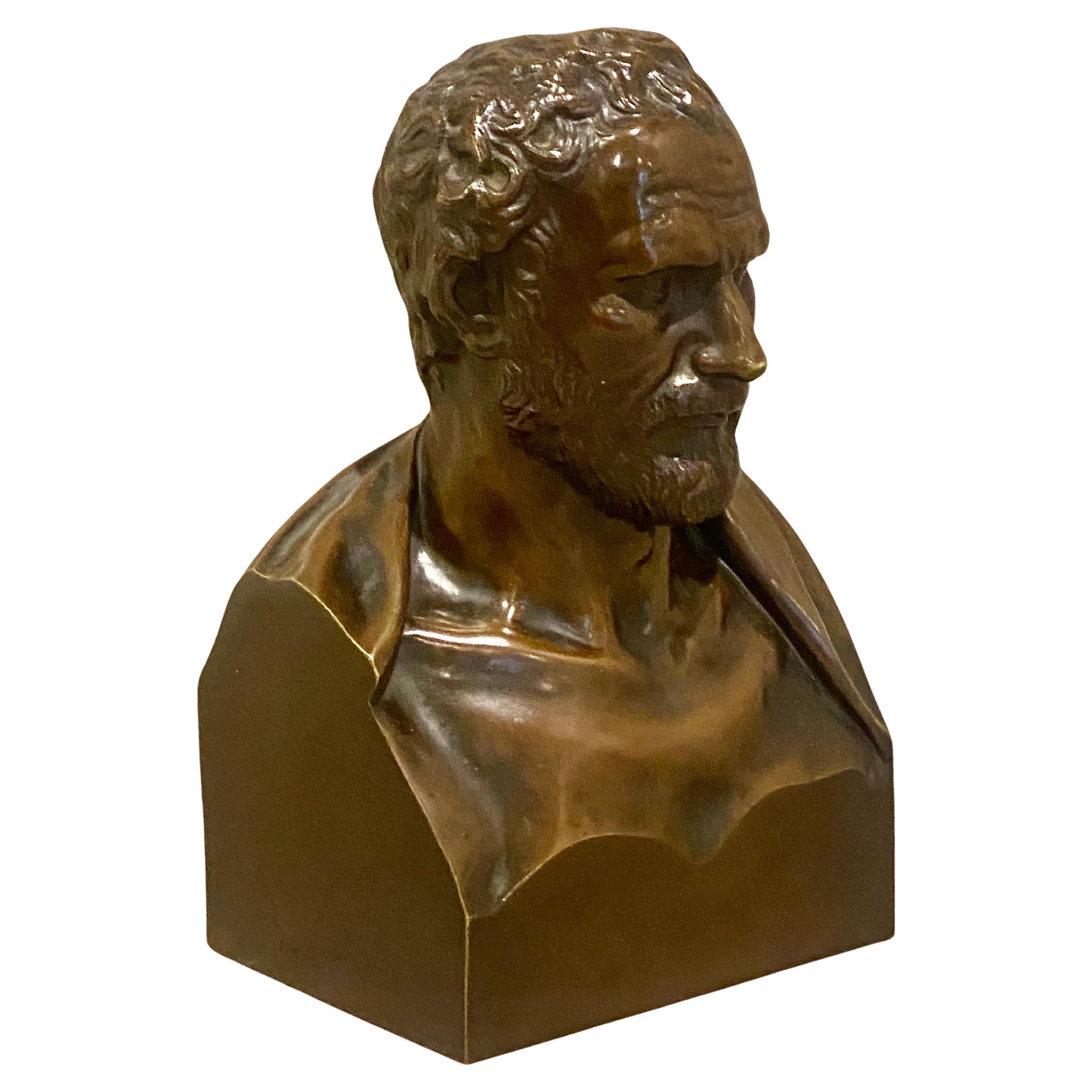 A mid 19th century bronze bust of Demosthenes Signed 