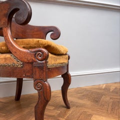 A mid 19th century French mahogany desk chair