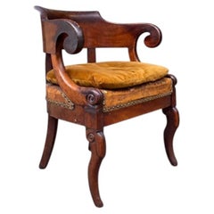 A mid 19th century French mahogany desk chair
