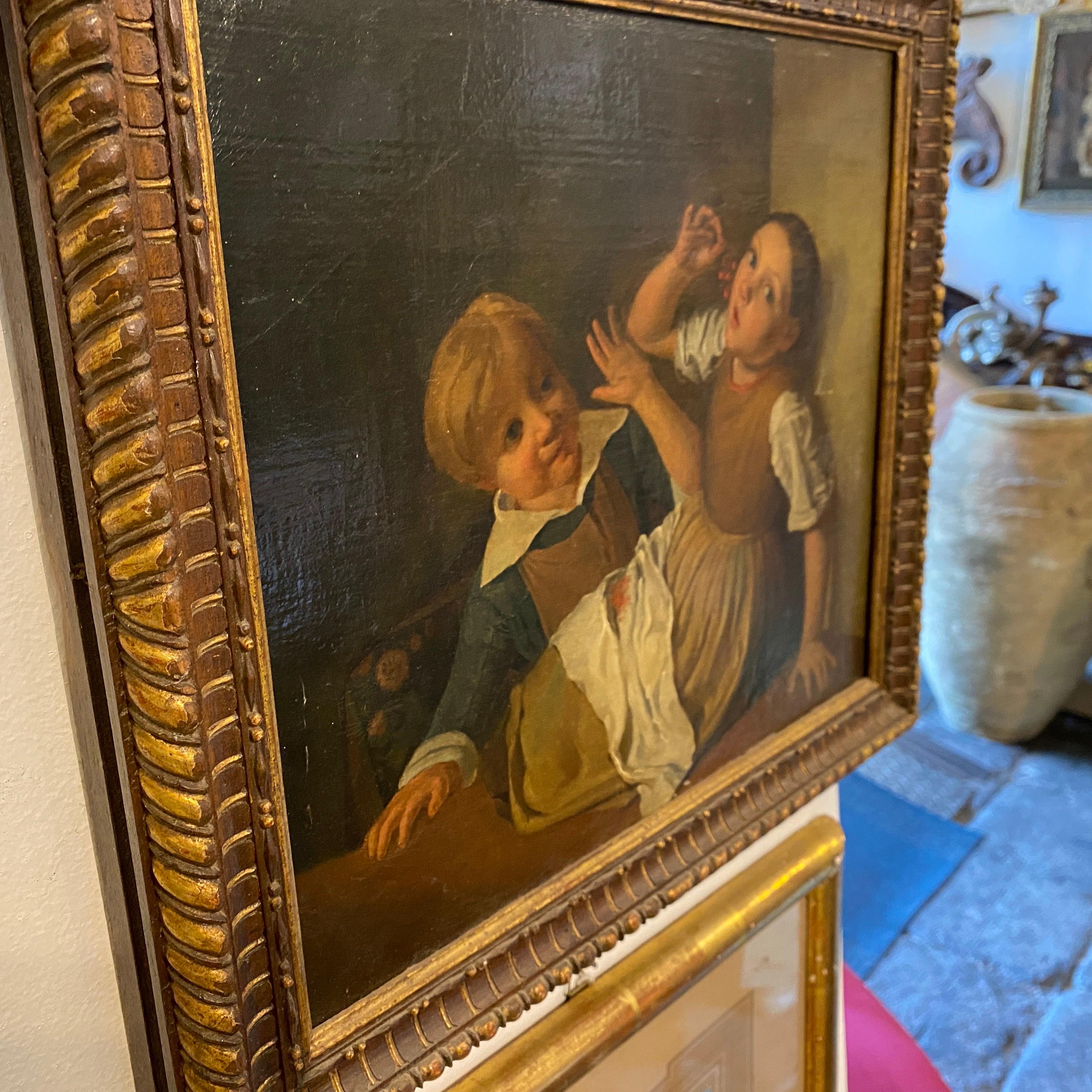 Mid-19th Century Giltwood Framed Painting Depicting Two Childs Eating Grape In Good Condition In Aci Castello, IT