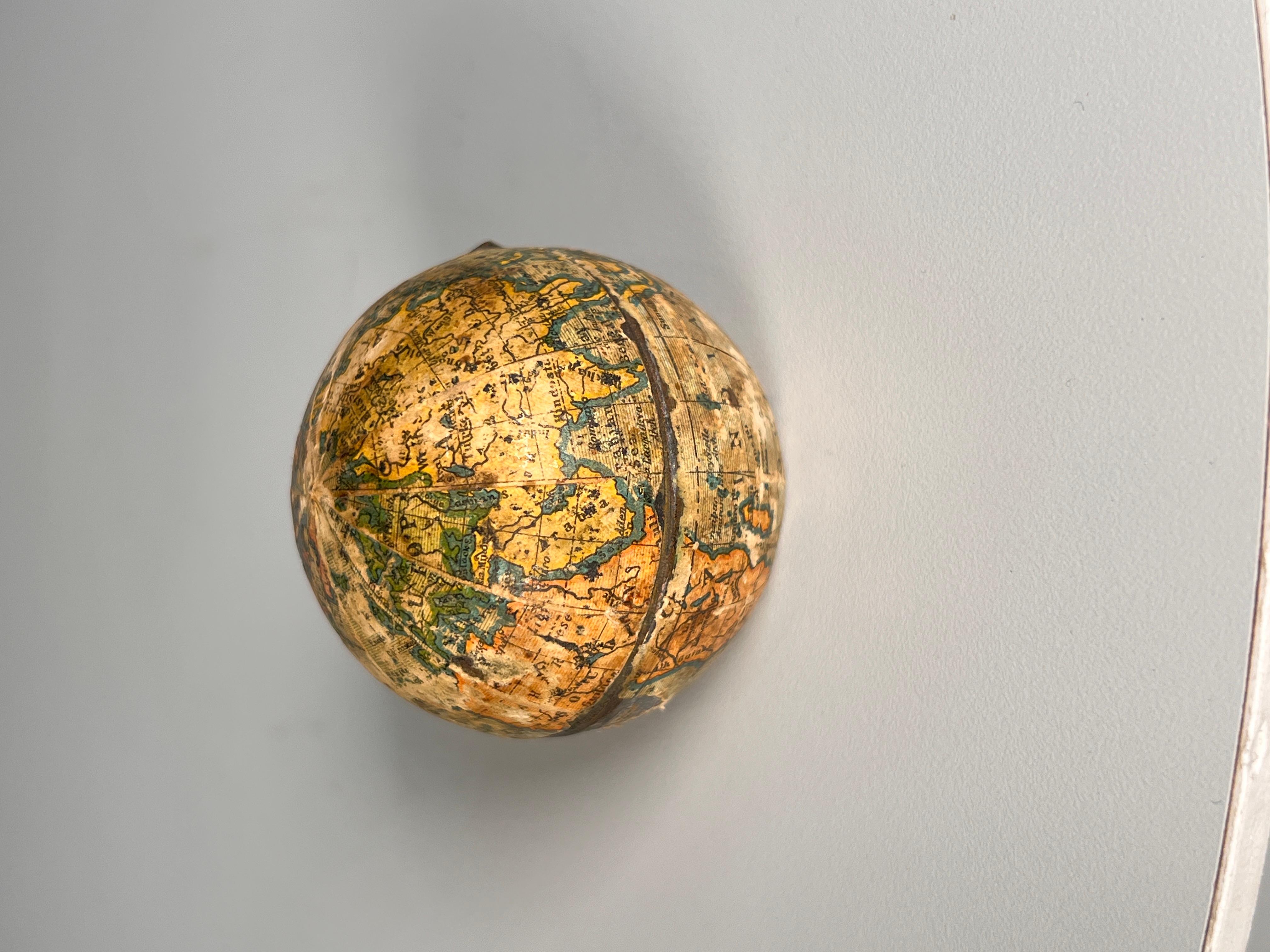 A fantastic inkwell in the form of a pocket globe, dating from the mid 19th century.
