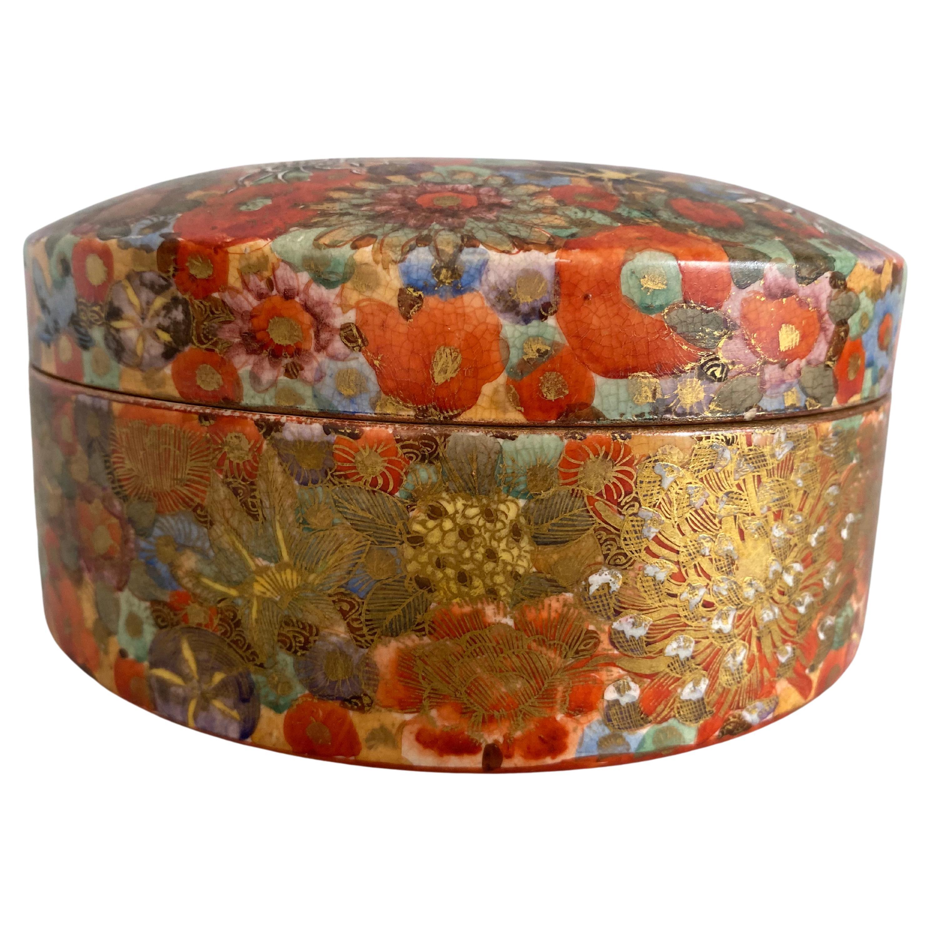 A mid 19th century Japanese Millefleur Satsuma round lid box, with Shimazu crest For Sale
