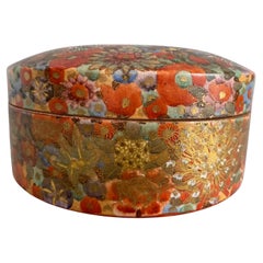 A mid 19th century Japanese Millefleur Satsuma round lid box, with Shimazu crest
