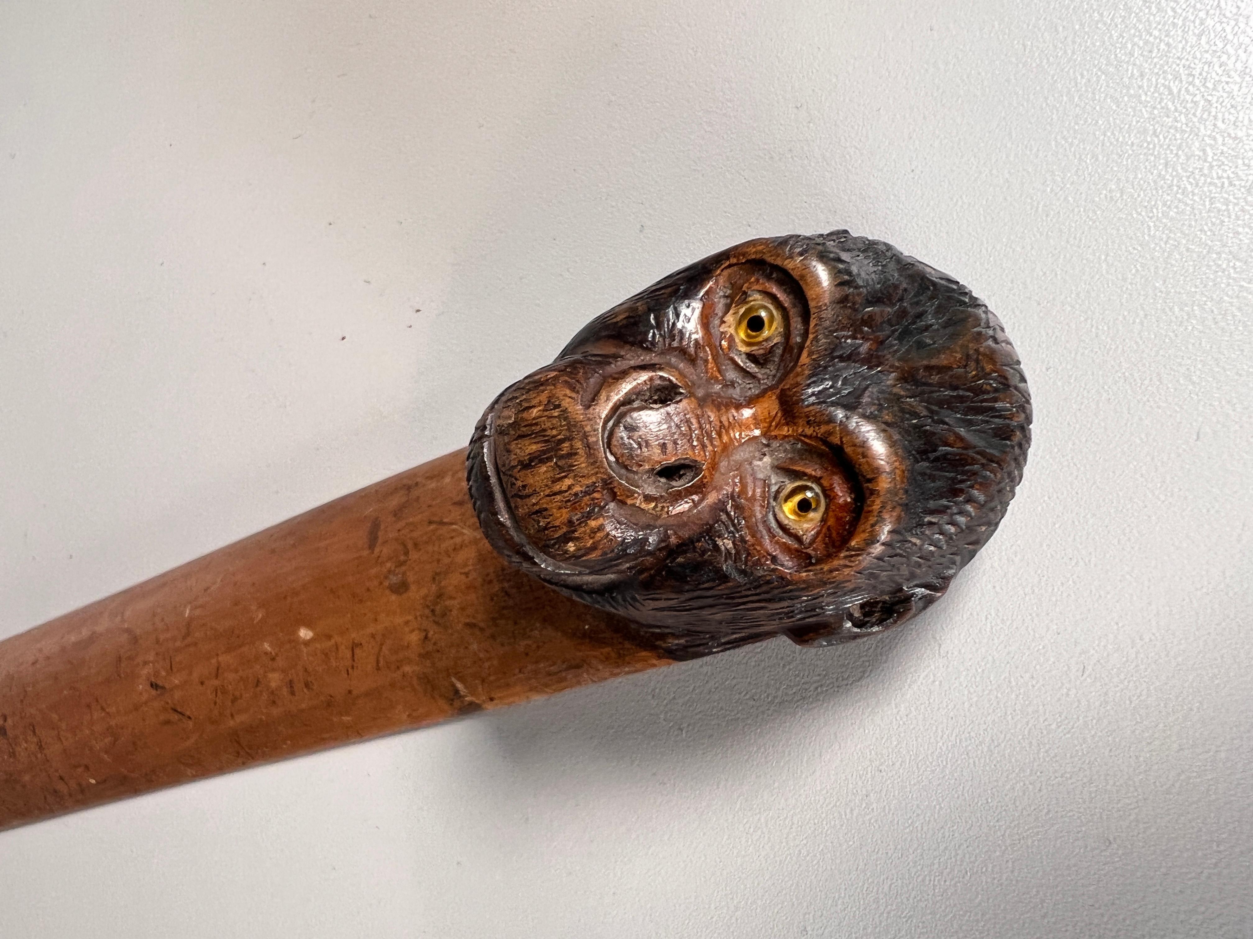 What a wonderful page turner. Realistically carved in the form of a monkey, the turner has that beautiful smooth patina from years of handling. 
Probably French CIRCA 1840.