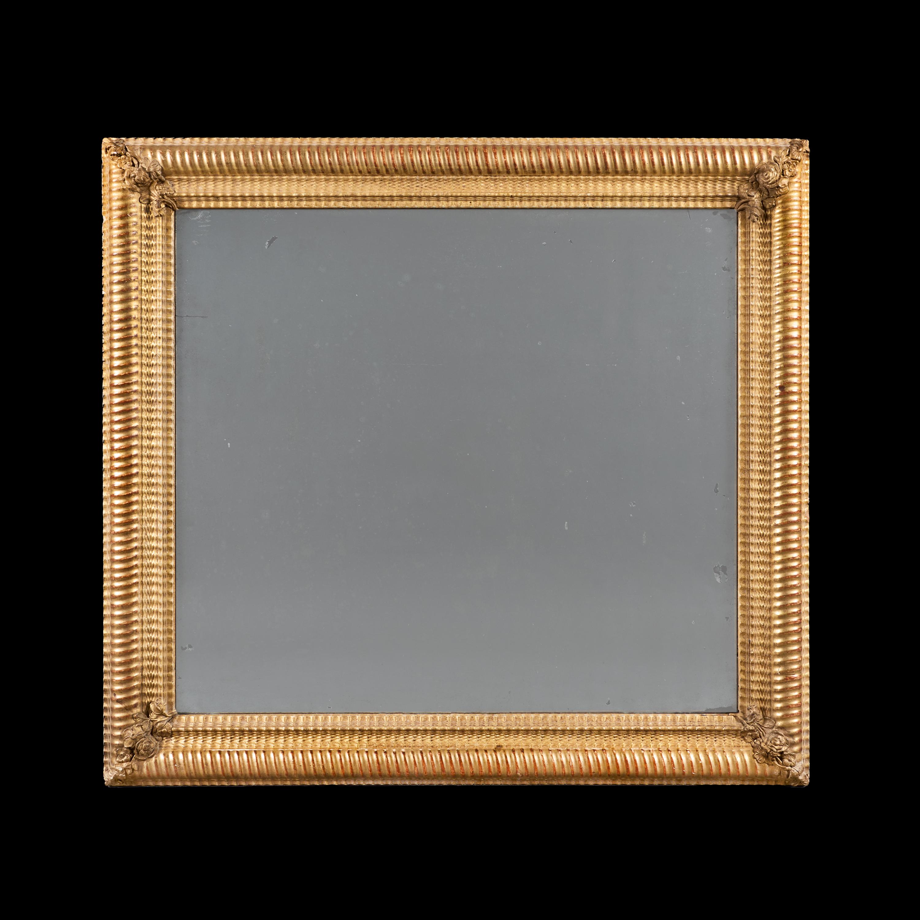 England, circa 1850

A mid-nineteenth century giltwood ripple mould mirror with cornucopias of flowers to the corners and a mercury mirror plate.

Height 88.00 centimetres.
Width 96.00 centimetres.