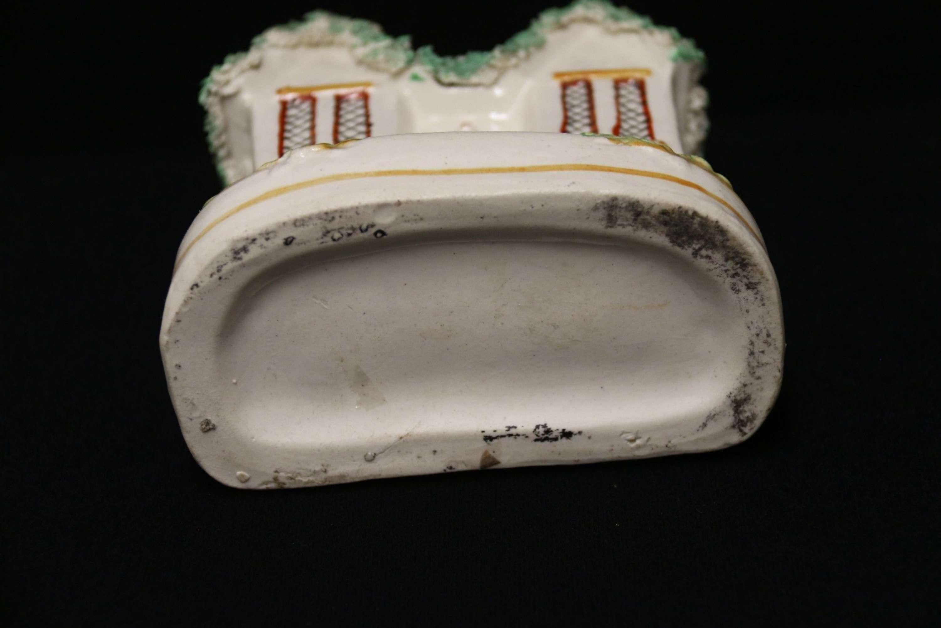 Hand-Painted A mid 19th century Staffordshire pottery cottage money box, Circa 1840 English For Sale