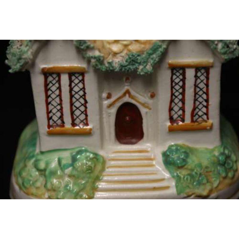 Pottery A mid 19th century Staffordshire pottery cottage money box, Circa 1840 English For Sale