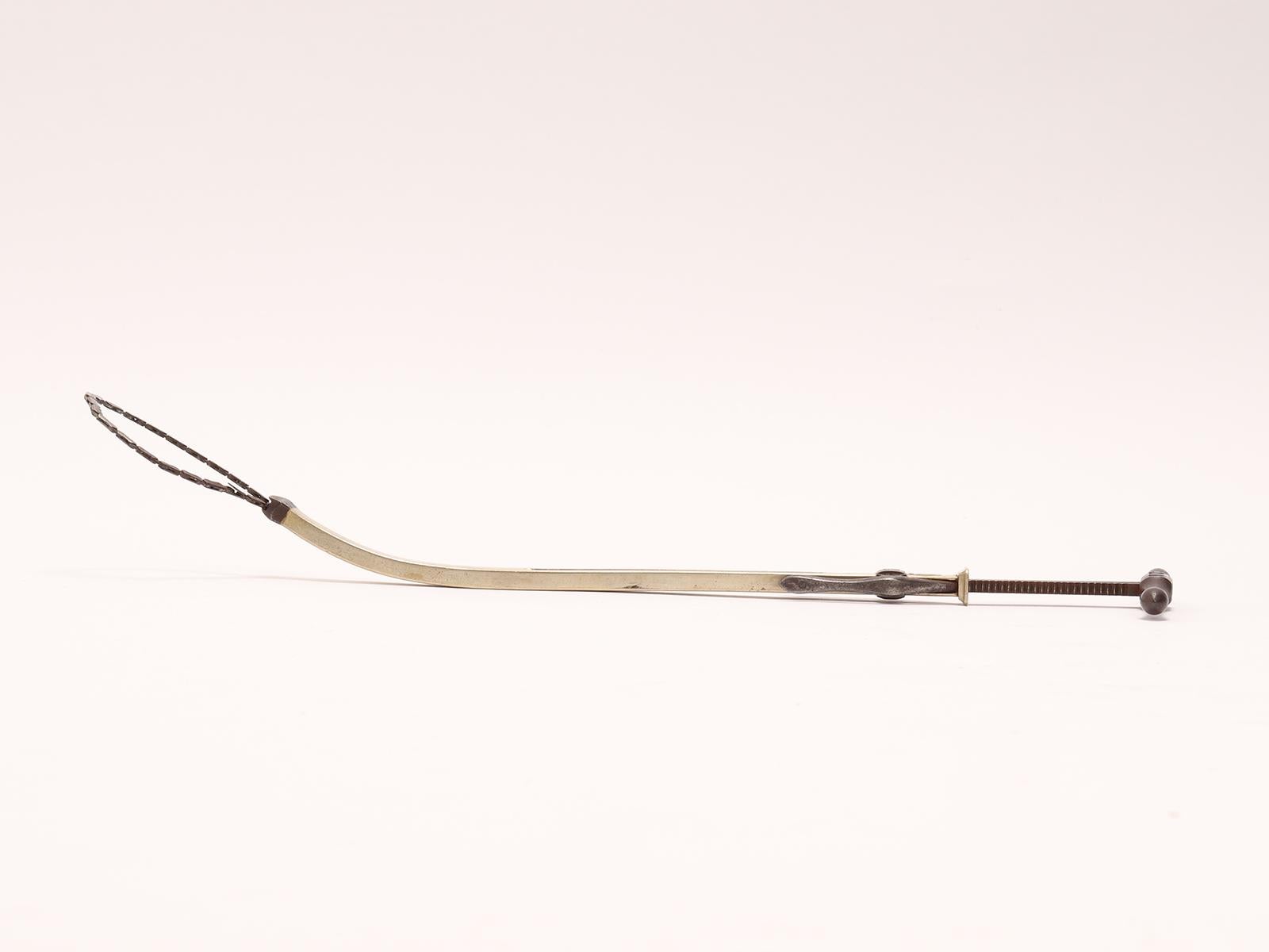 A mid-19th century surgeon's instrument, a saw. Lollini Brothers, Bologna, Italy In Good Condition For Sale In Milan, IT