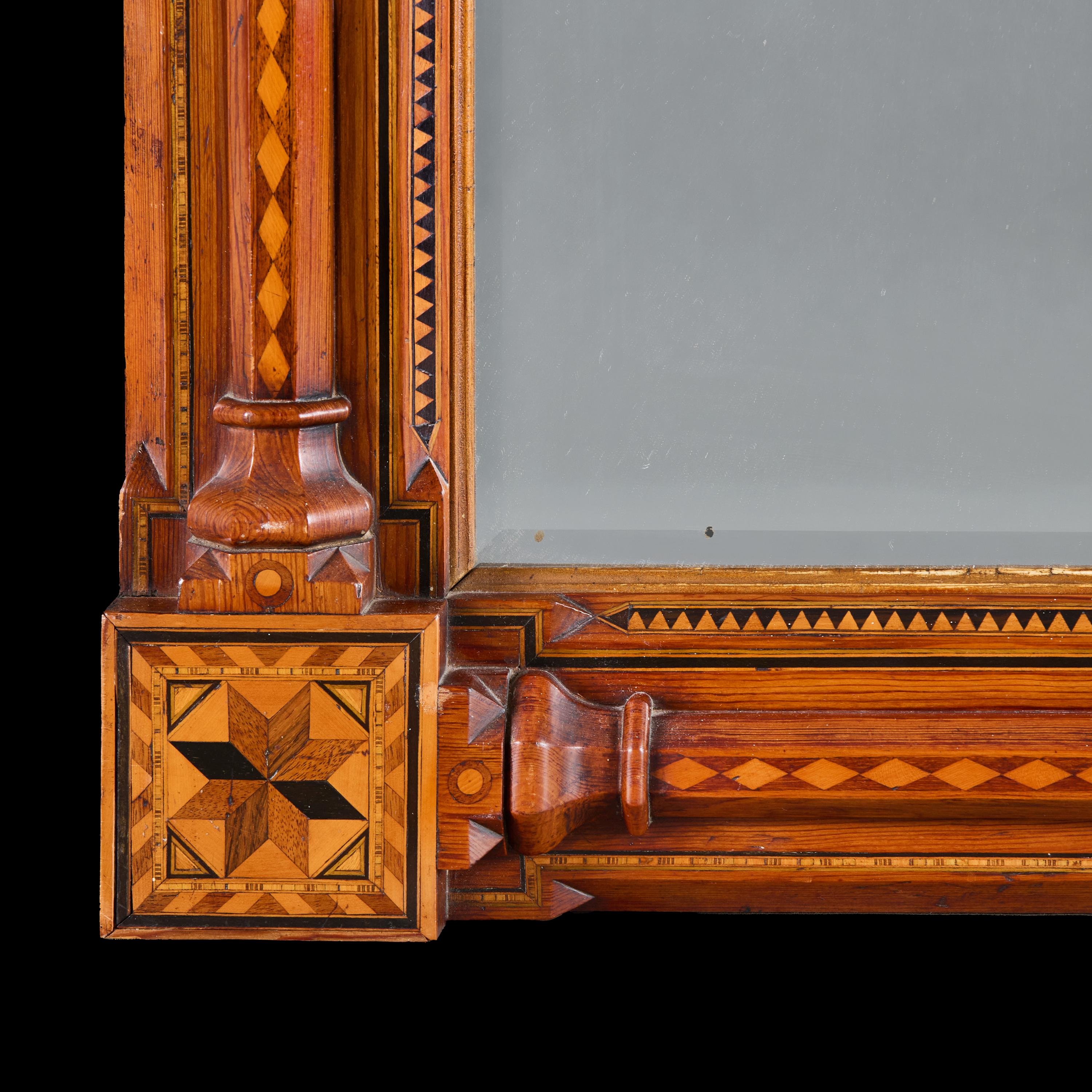 Inglese, circa 1850.

Un insolito specchio rettangolare di Tunbridge Ware della metà del XIX secolo con patere in parquet colorato agli angoli e piastra originale smussata.

Altezza 71.50 centimetri.
Larghezza 58.50 centimetri.