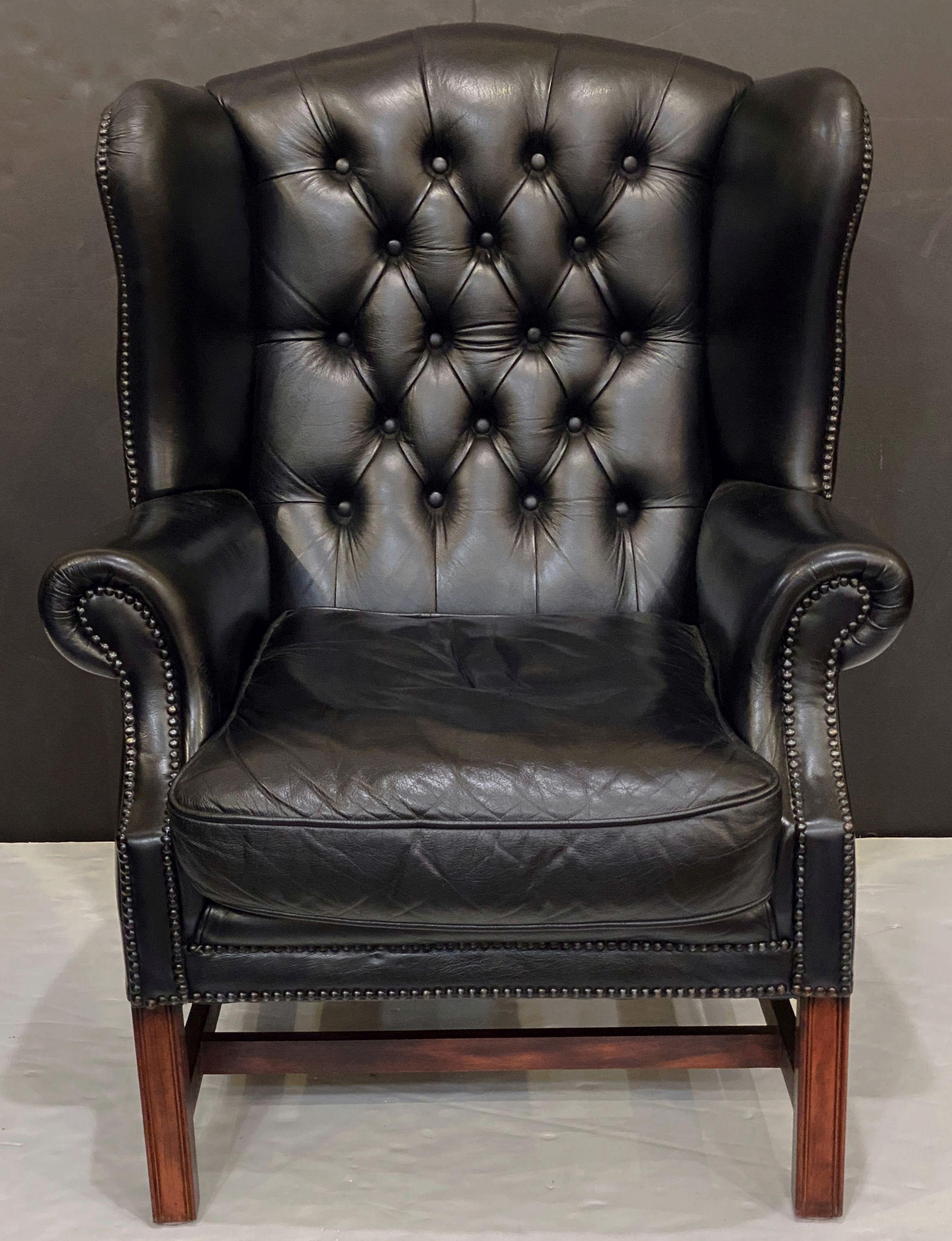 20th Century Large English Wing Back Chair of Black Leather in the George III Style For Sale