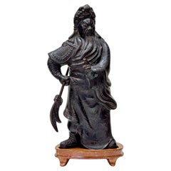 A Mid 20th Century Chinese Cast Bronze Statue of Guan Yu with Guandao on Stand