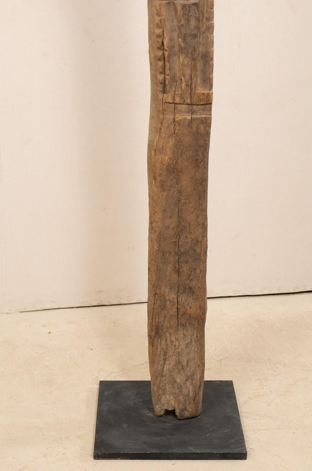Wood A Dogon Tribe Toguna Post from Mali (Mid 20th C.) on Custom Iron Stand For Sale