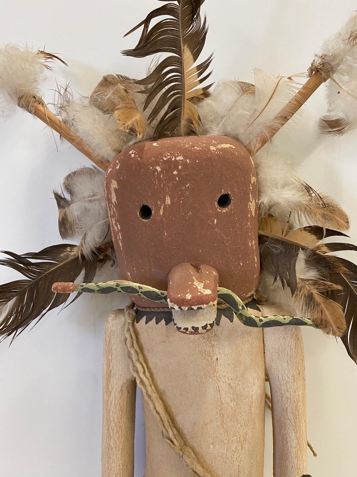 This is an unusually large, hand carved and painted, cotton wood Kachina figure. It is likely 