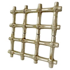 A mid-20th century Italian telescopic bamboo-style trivet