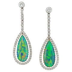 A mid-20th century opal and diamond drop earrings