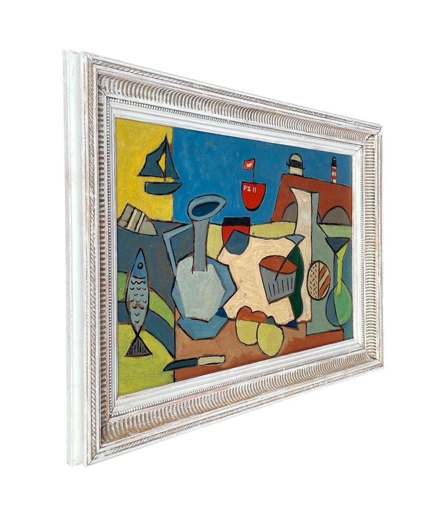 A mid century abstract still life, of fruit, fish and jug set against a harbour backdrop of boats and sea. Well executed and unsigned piece framed in whitewash frame. Possibly a Cornish scene with the PZ onn the boat being Penzance.