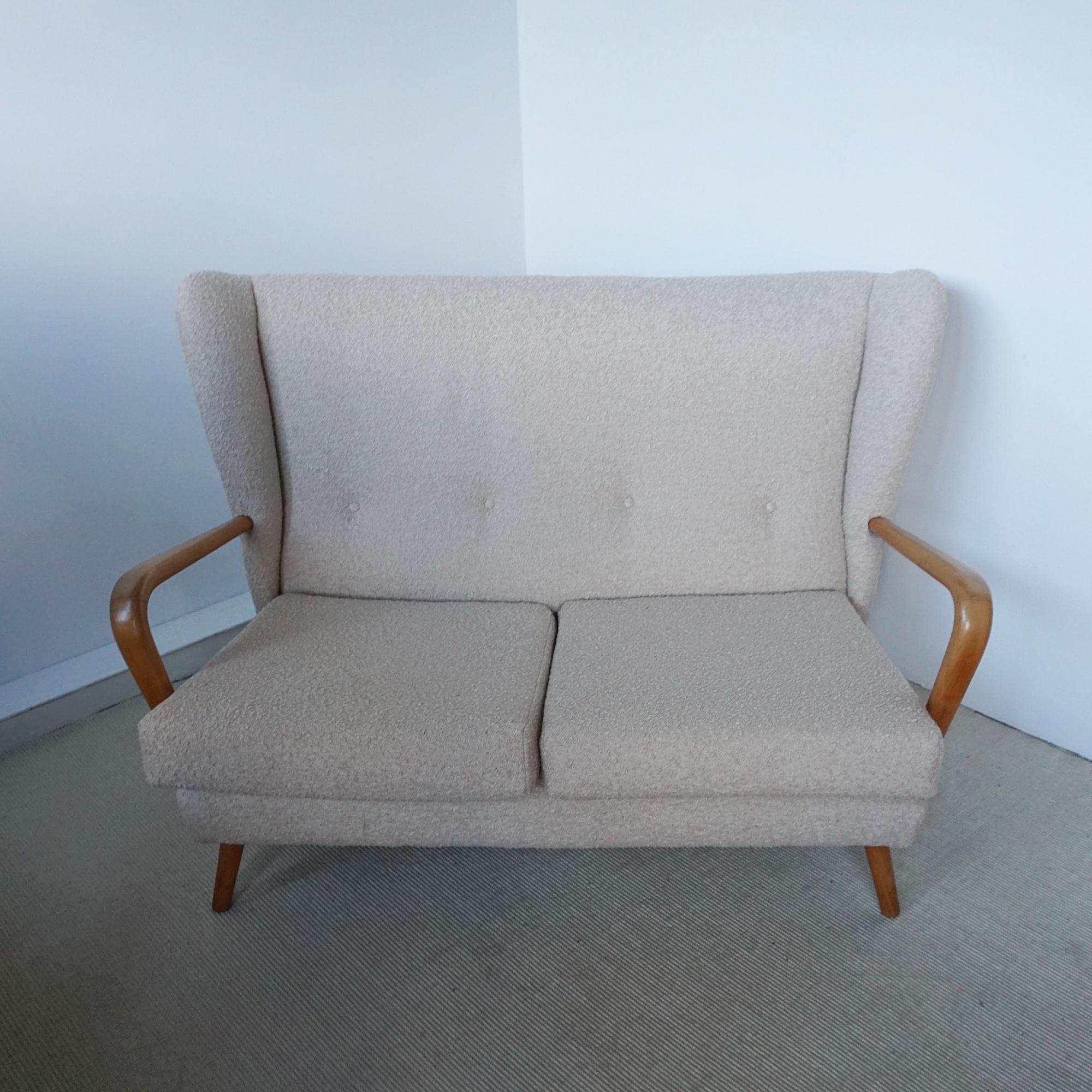 A Mid-Century 'Bambino' sofa designed by Howard Keith for HK Furniture. Solid beech, re-upholstered in bouclé.

Dimensions: H 89cm W 130cm D 69cm Seat H 40cm

Origin: English

Date: Circa 1950

Item Number: 0301253

All of our furniture is