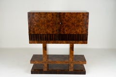 A Mid-Century Bar Cabinet with Walnut Burl Doors