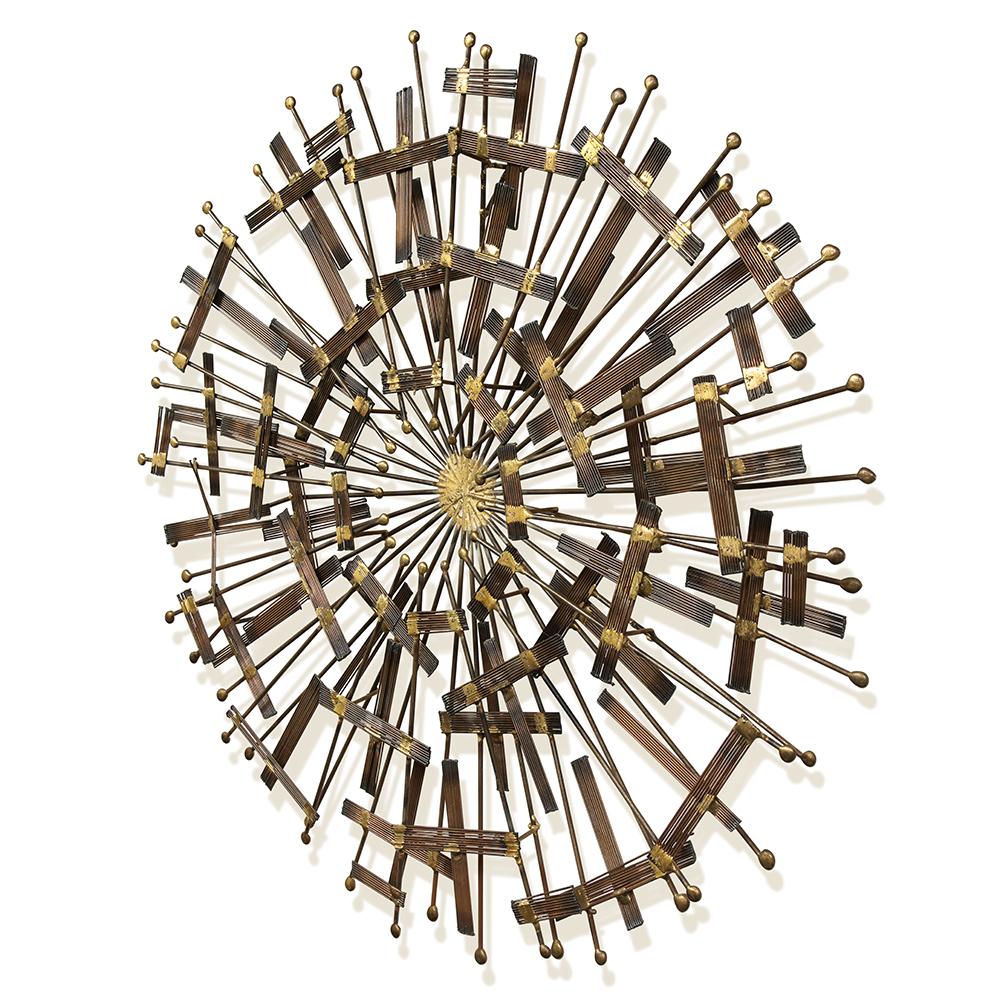 A mid-century brass and metal wall sculpture in the manner of C.Jere, circa 1970.
 