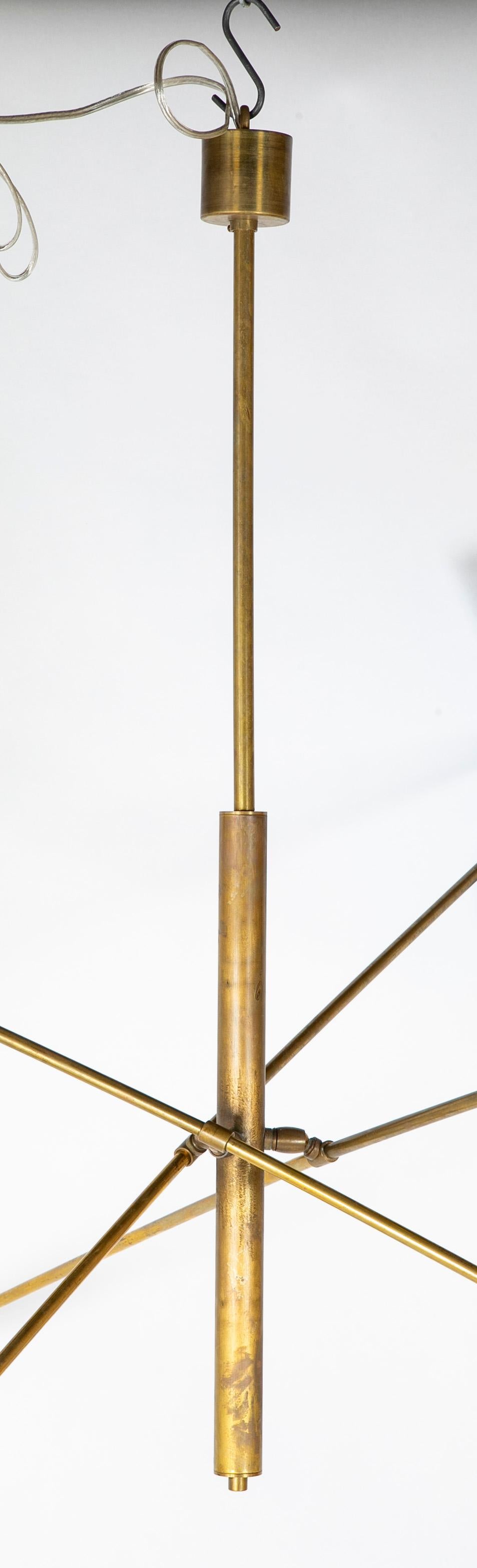 A Mid-Century chandelier in the manner of Stilnovo.  Circa 1970.

32.63