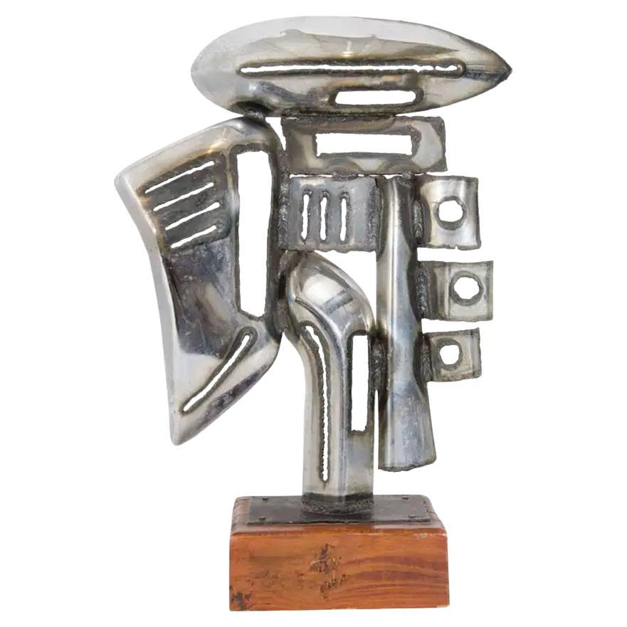 Scultura di paraurti d'auto cromato di metà secolo firmata "T.P.", circa anni '70 in vendita