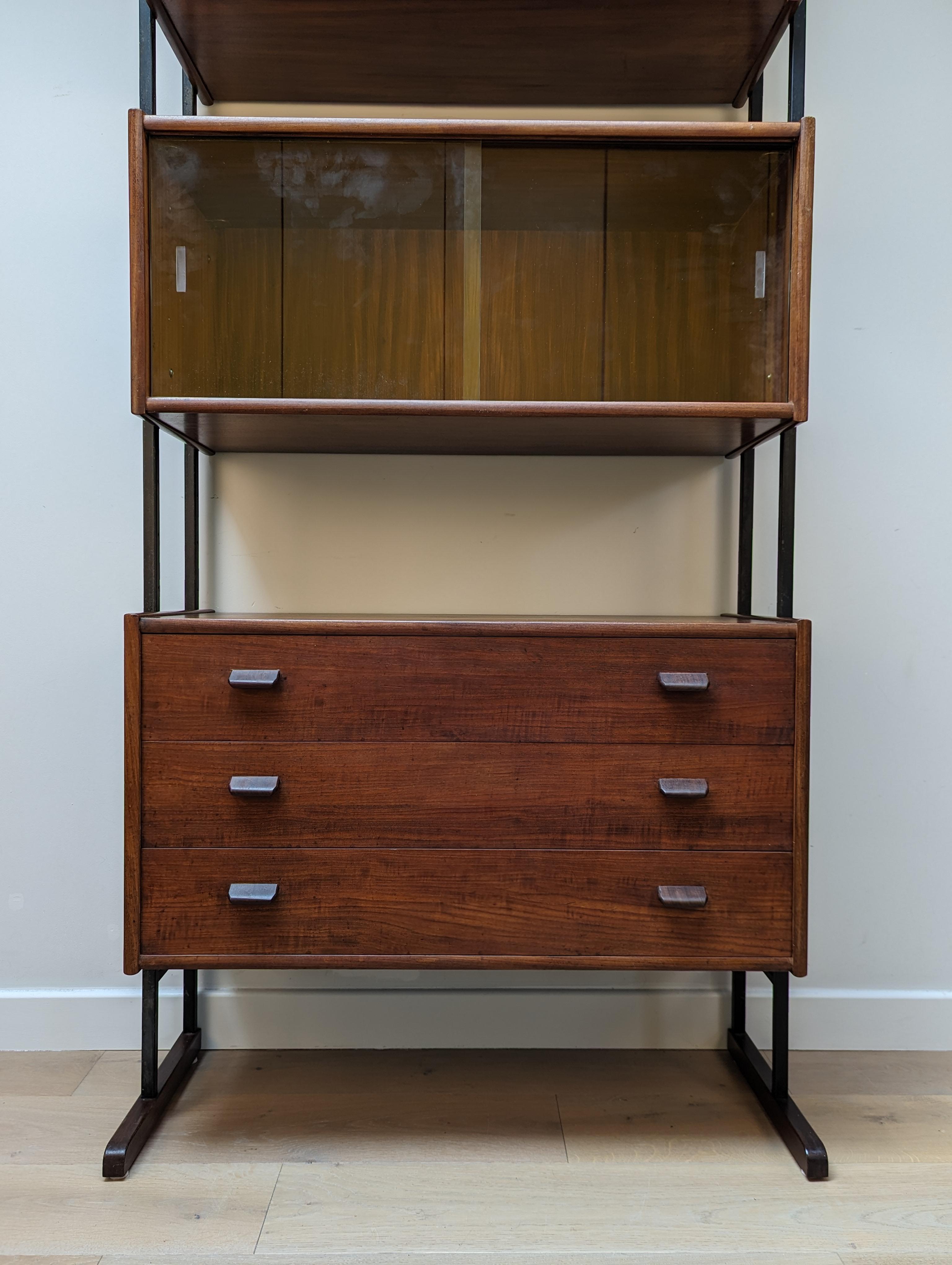 A mid-century free standing cabinet by Robex in teak with metal supports In Good Condition For Sale In Tunbridge Wells, GB