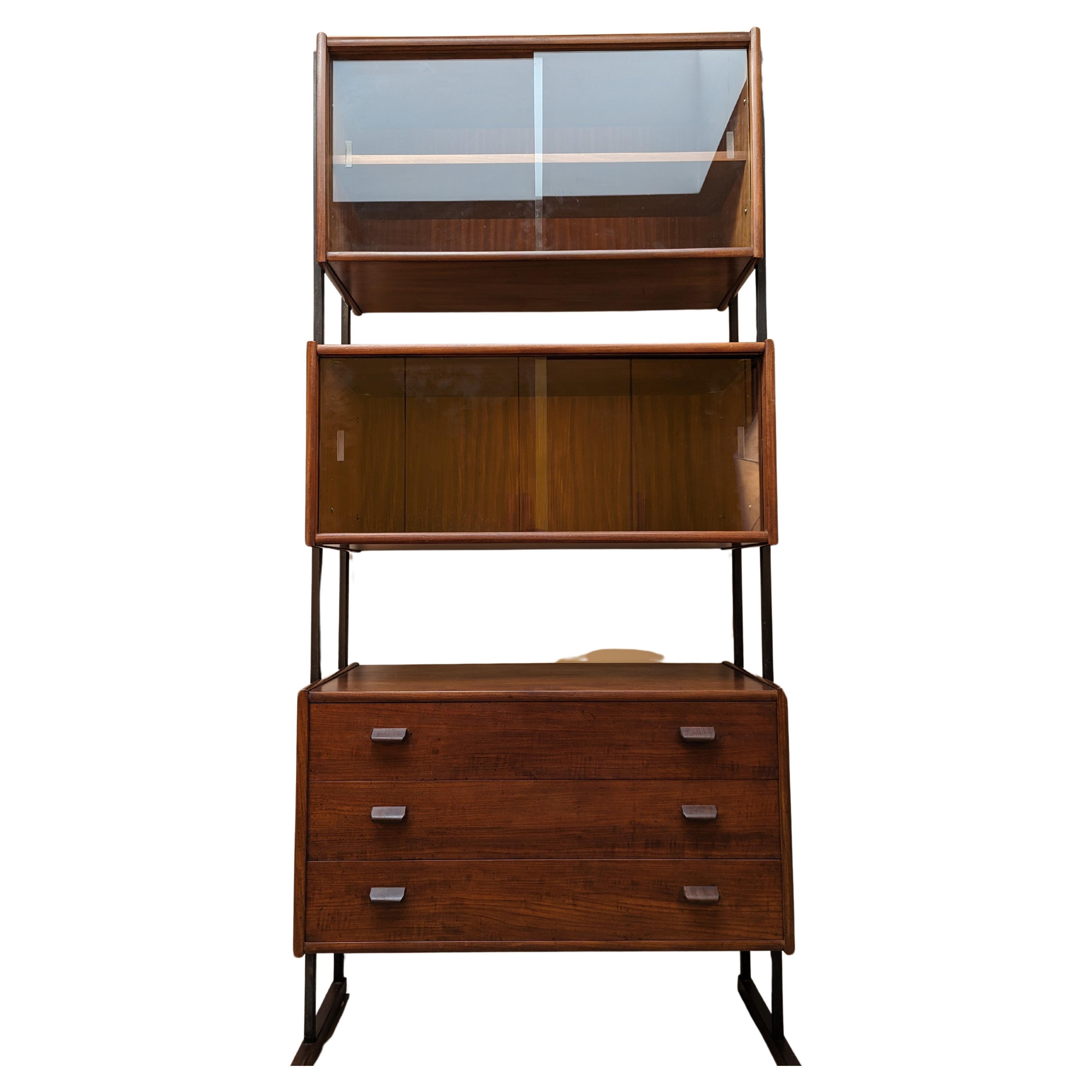 A mid-century free standing cabinet by Robex in teak with metal supports For Sale