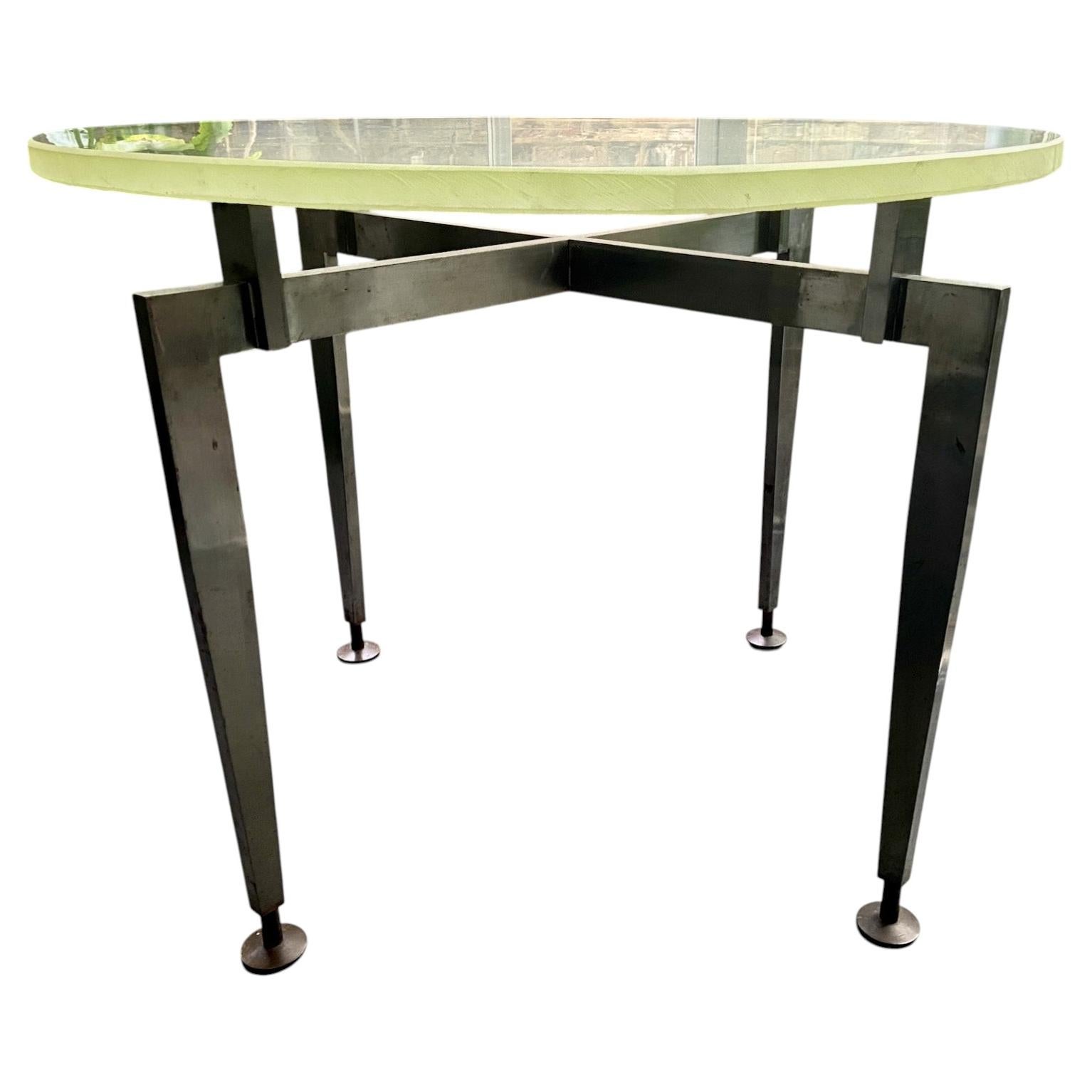 Mid-Century Modernist French Steel Gueridon with sandcast St. Gobain glass top.