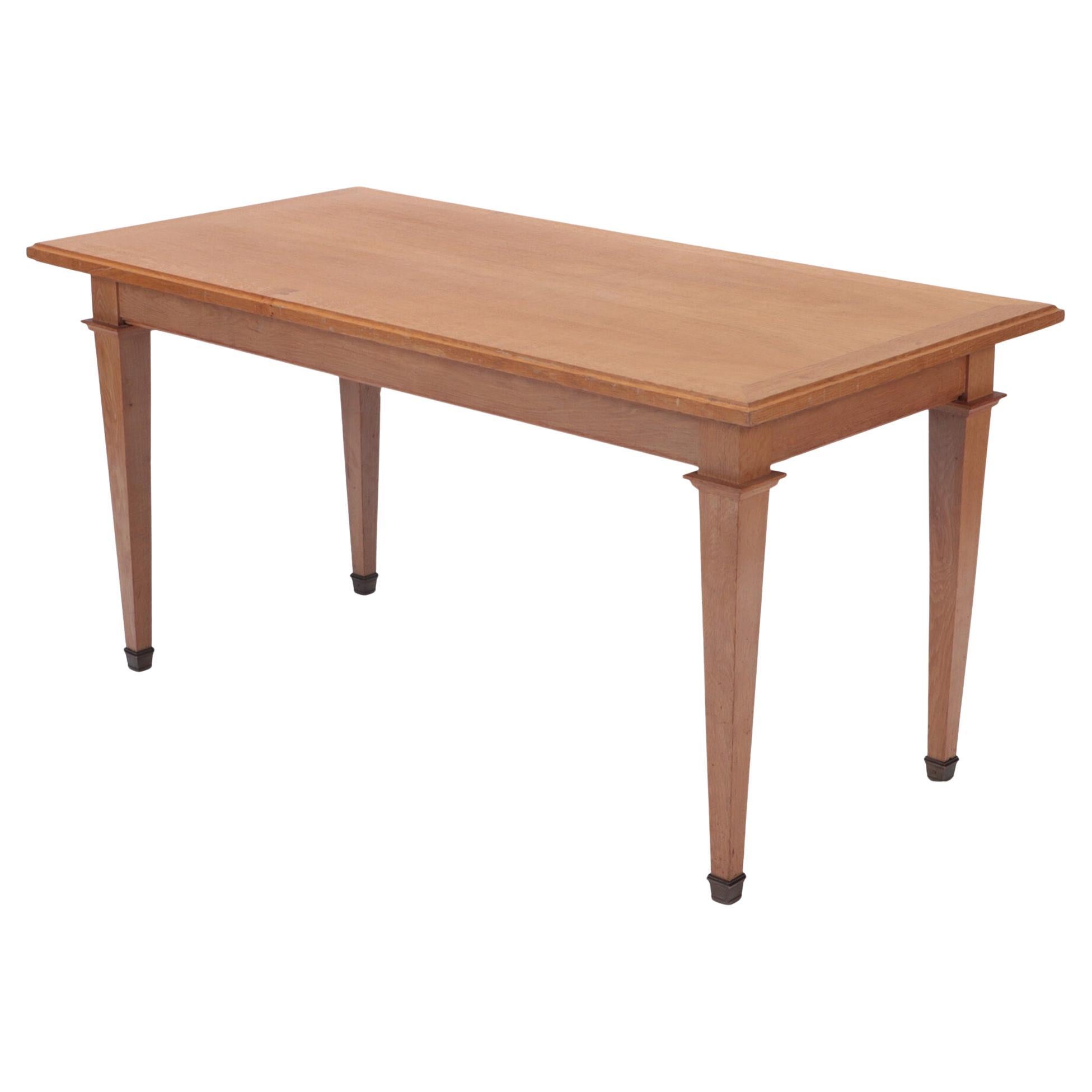 Mesa de biblioteca francesa de roble de mediados de siglo, a la manera de Jacques Adnet, c. 1940. en venta