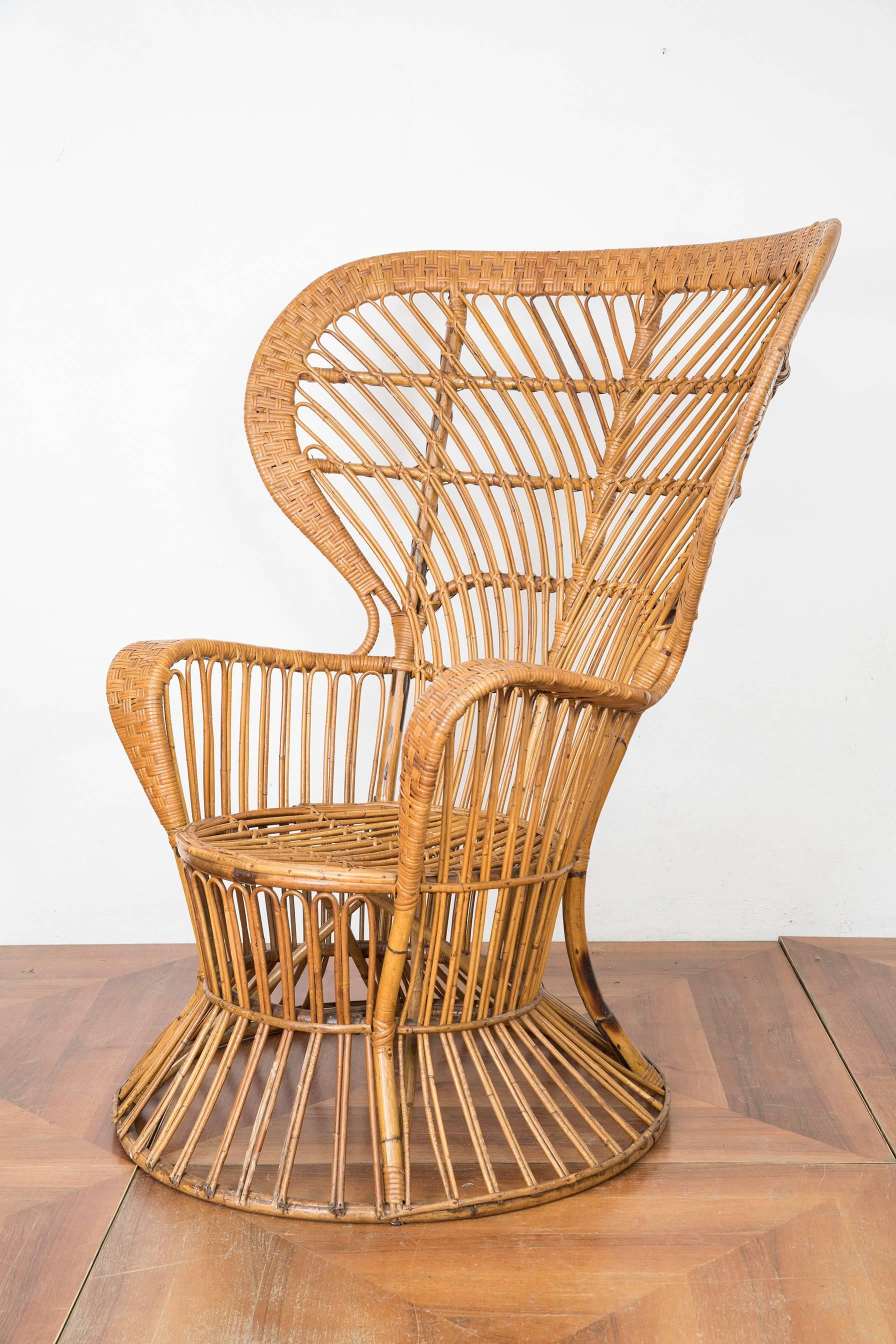 A wicker armchair designed by Lio Carminati produced by Bonacina. The armchairs were specifically designed for the prestigious cruise ship Conte Biancamano, Gio Ponti choose his former students fan chair to furnish part of the vessels interior.
The