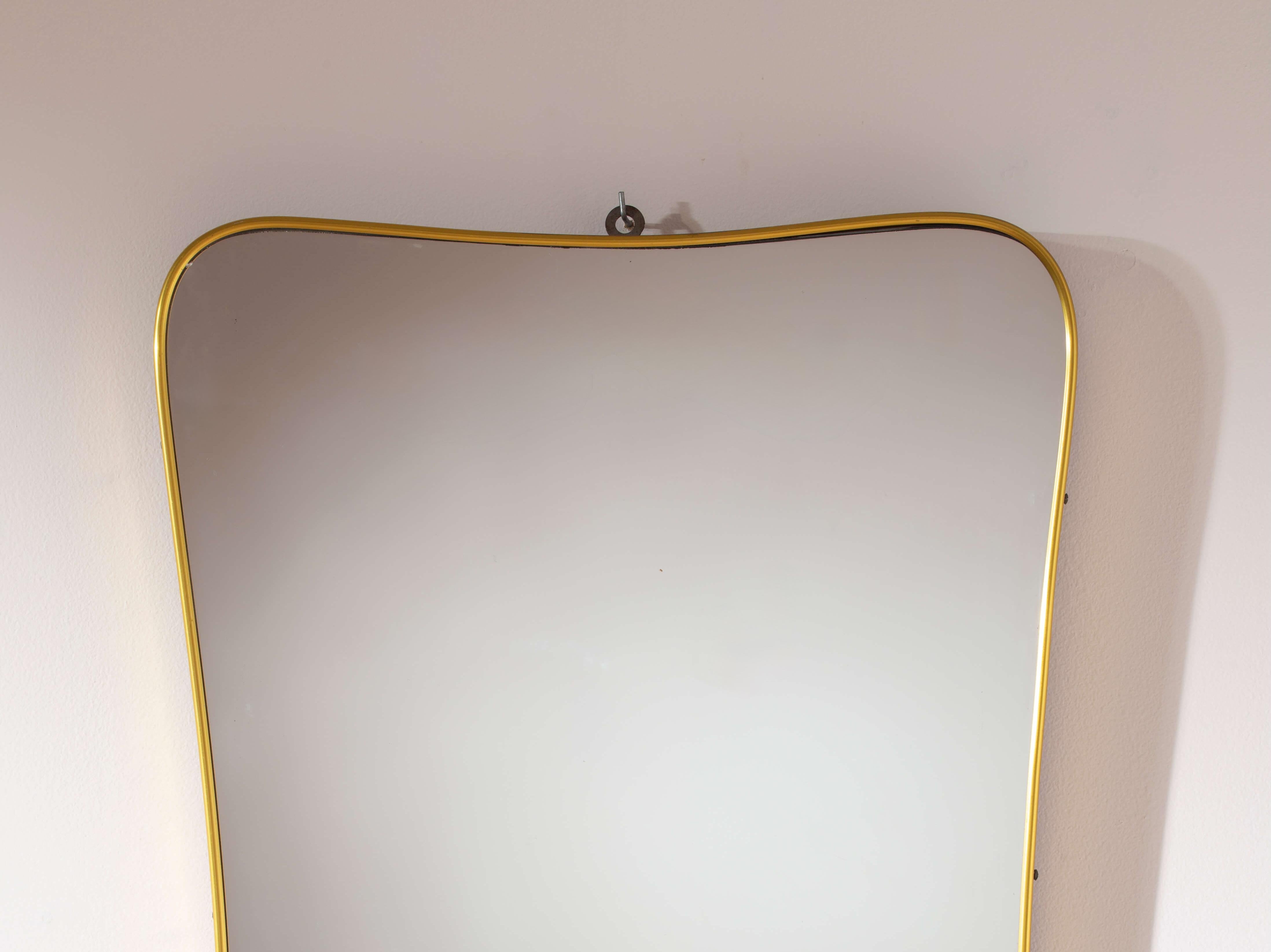 Brass A mid-century Italian brass mirror in the style of Gio Ponti, 1960s For Sale