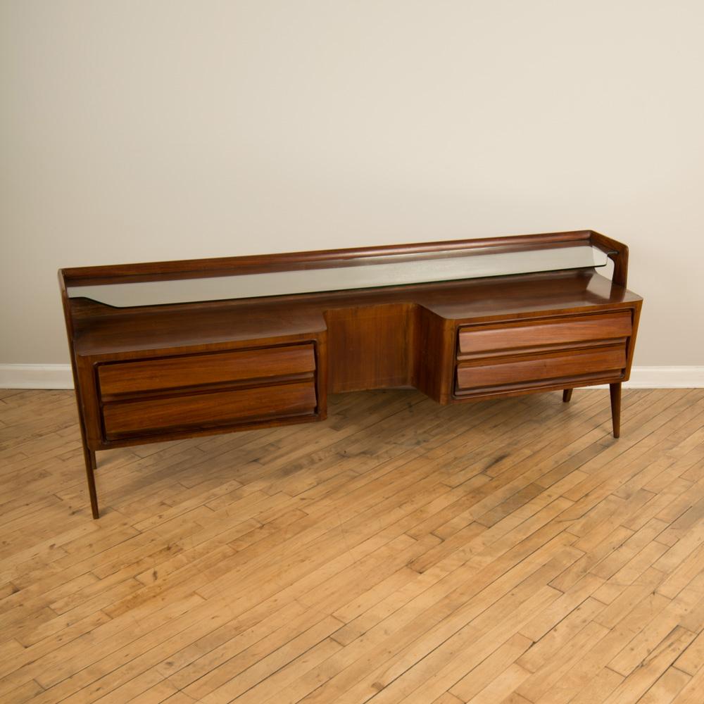 A Mid Century Italian Rosewood Dresser with Glass Shelf, Circa 1950 In Good Condition In Philadelphia, PA