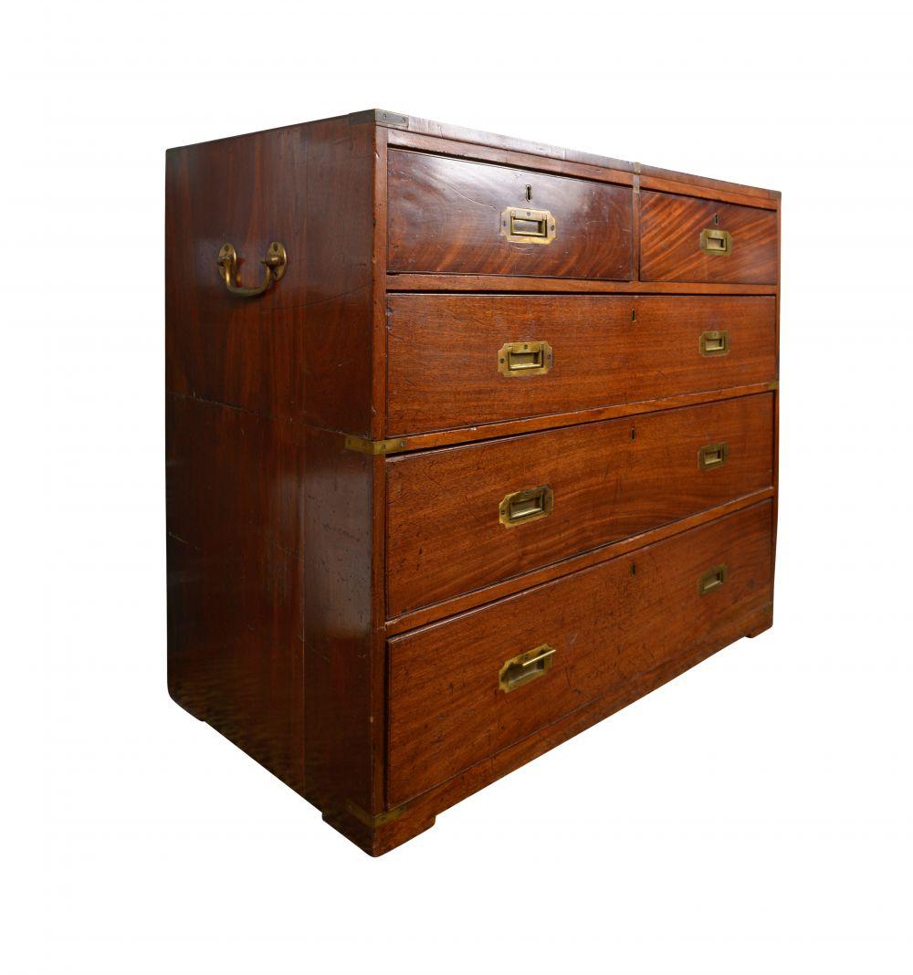 Comprising two parts, with the upper section mounted with carrying handles to the sides; fitted with two short over three graduated drawers.
