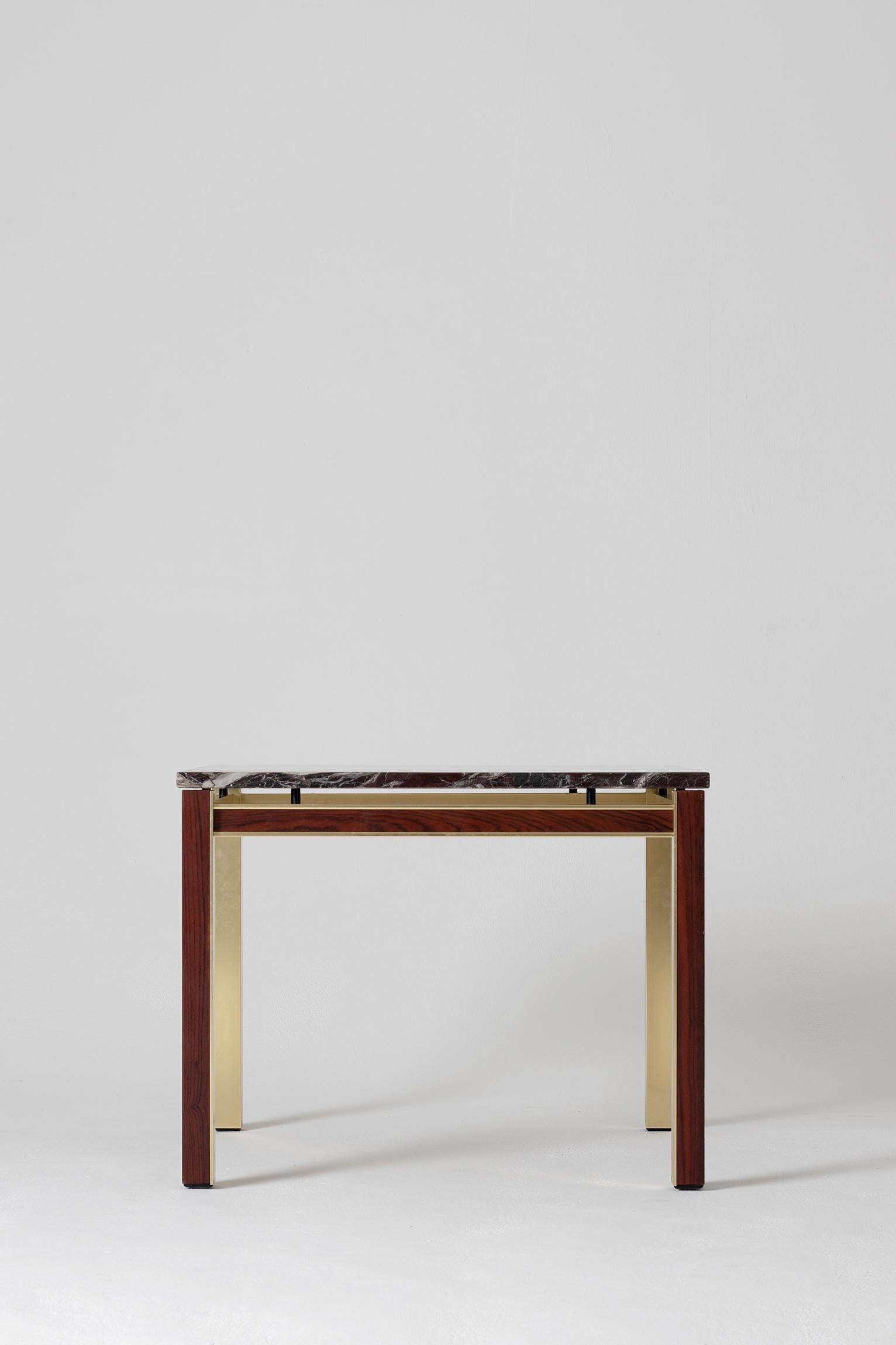 A brass, mahogany and marble top square side table
Denmark, circa 1970.