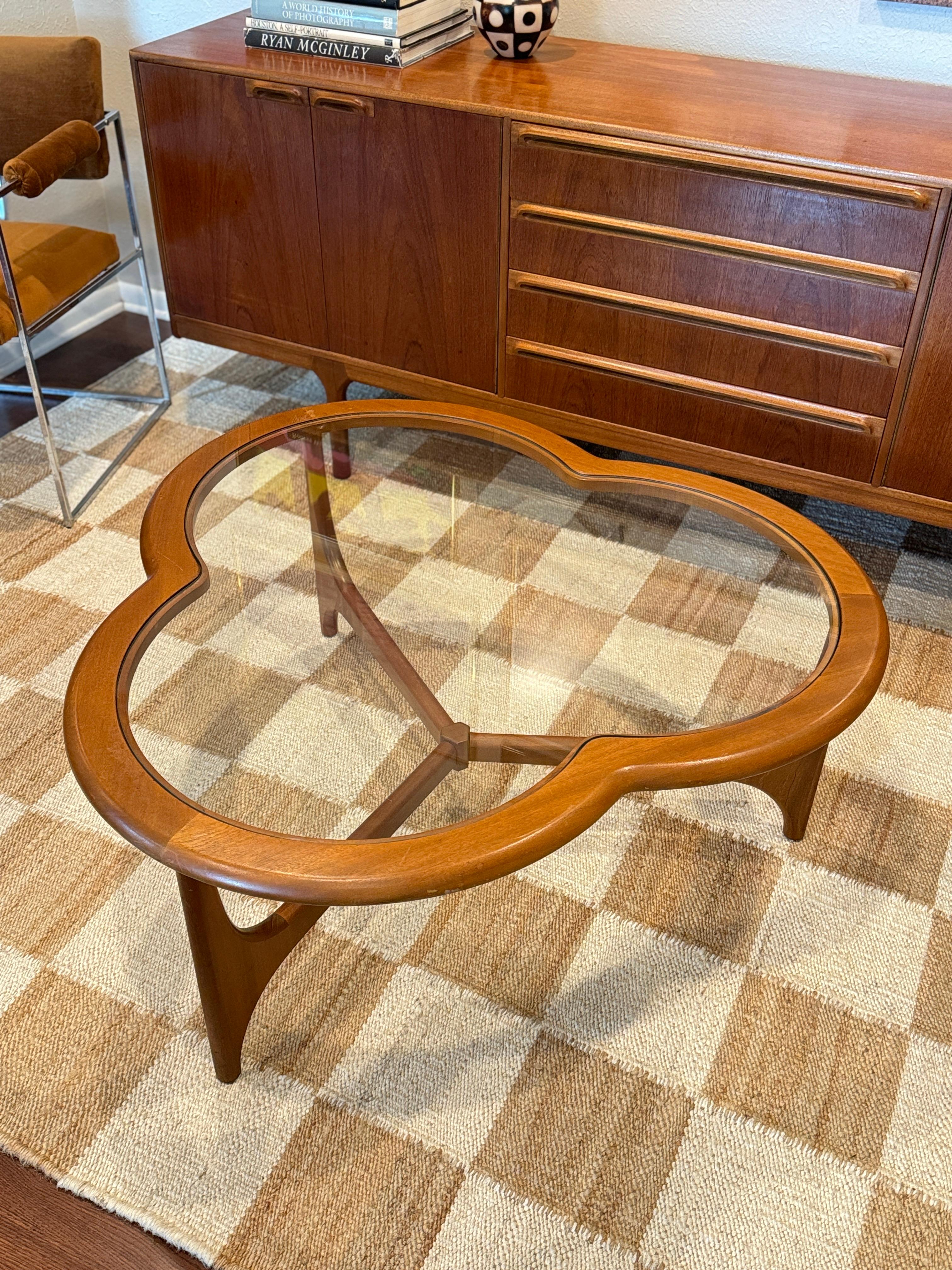 A mid century modern 3 leaf clover coffee table from the Stonehill Stateroom 4