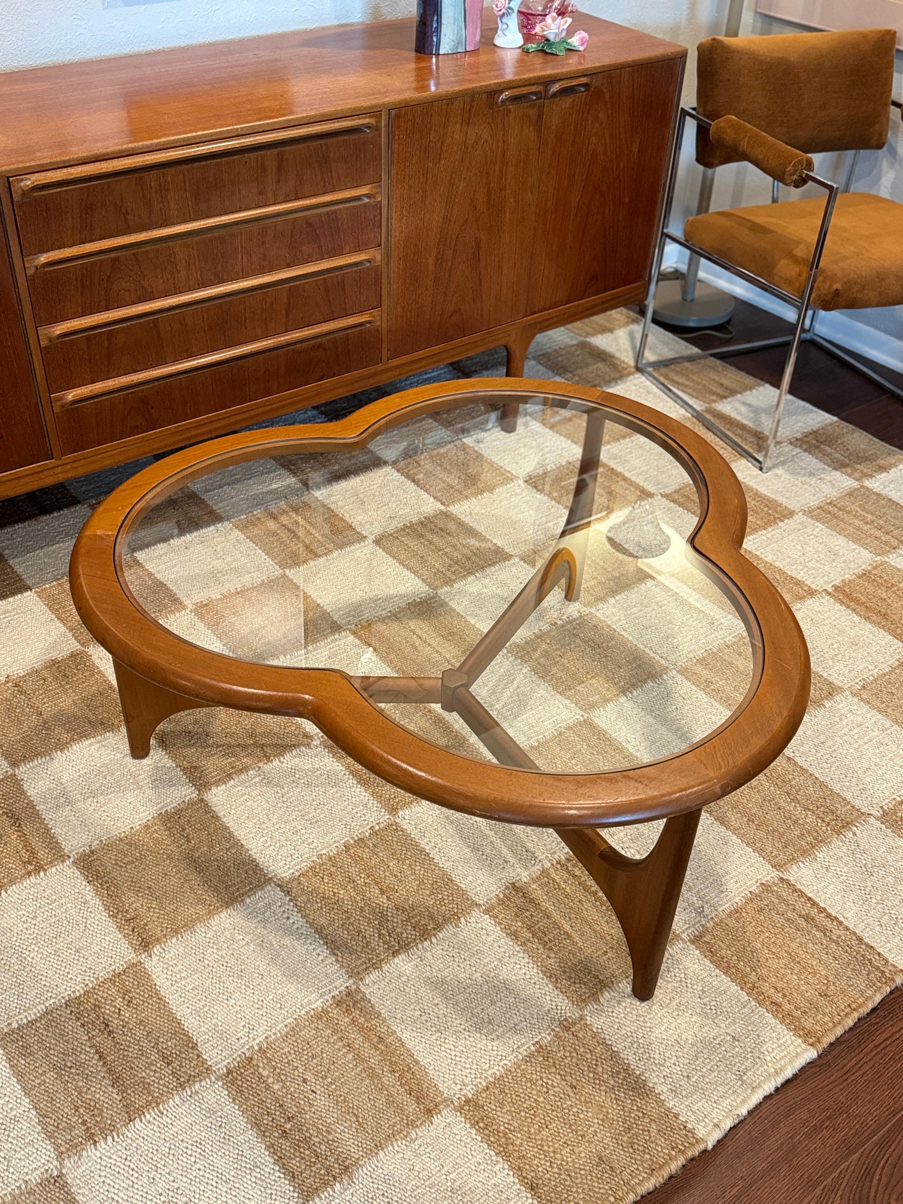 A mid century modern 3 leaf clover coffee table from the Stonehill Stateroom 5