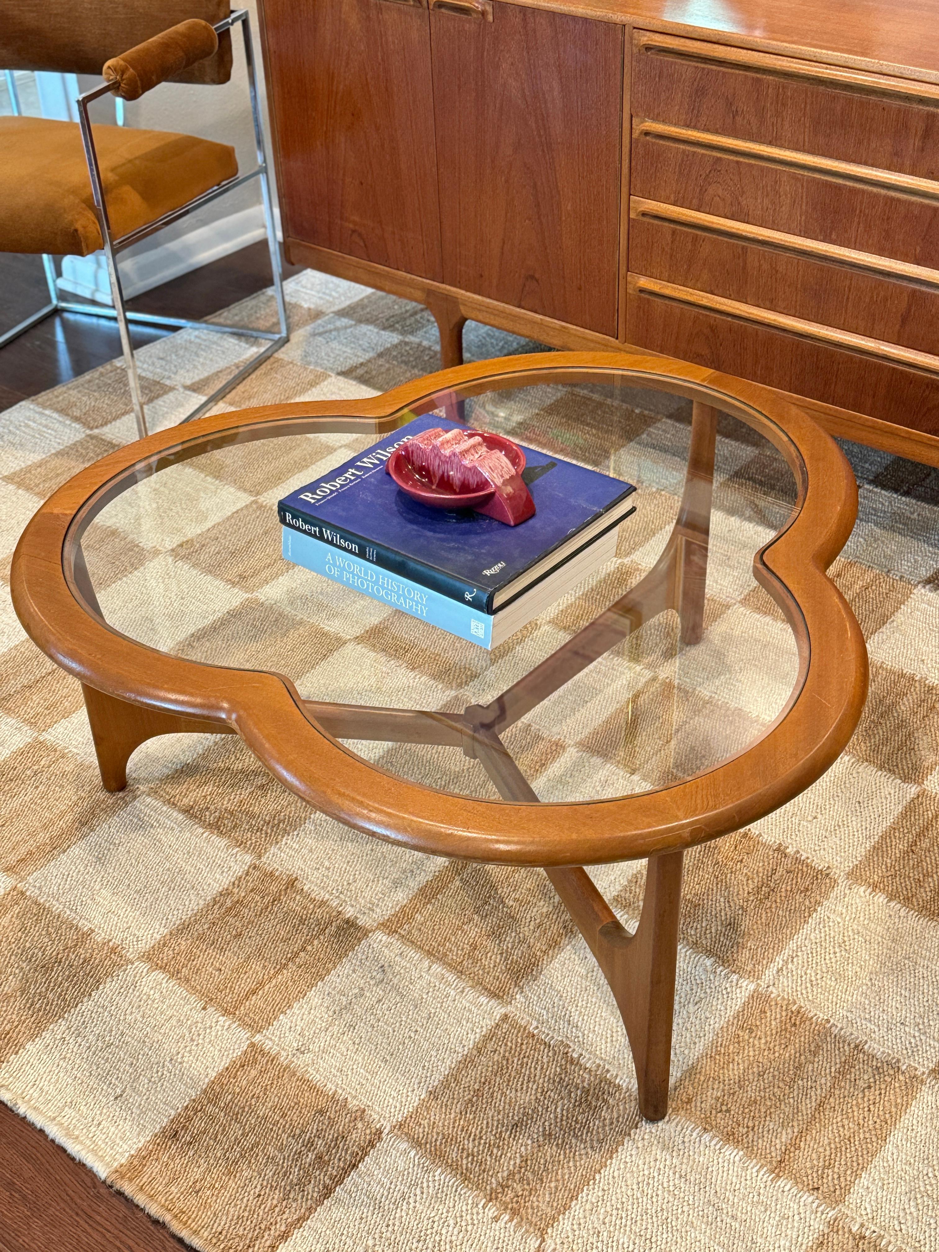 Mid-Century Modern A mid century modern 3 leaf clover coffee table from the Stonehill Stateroom