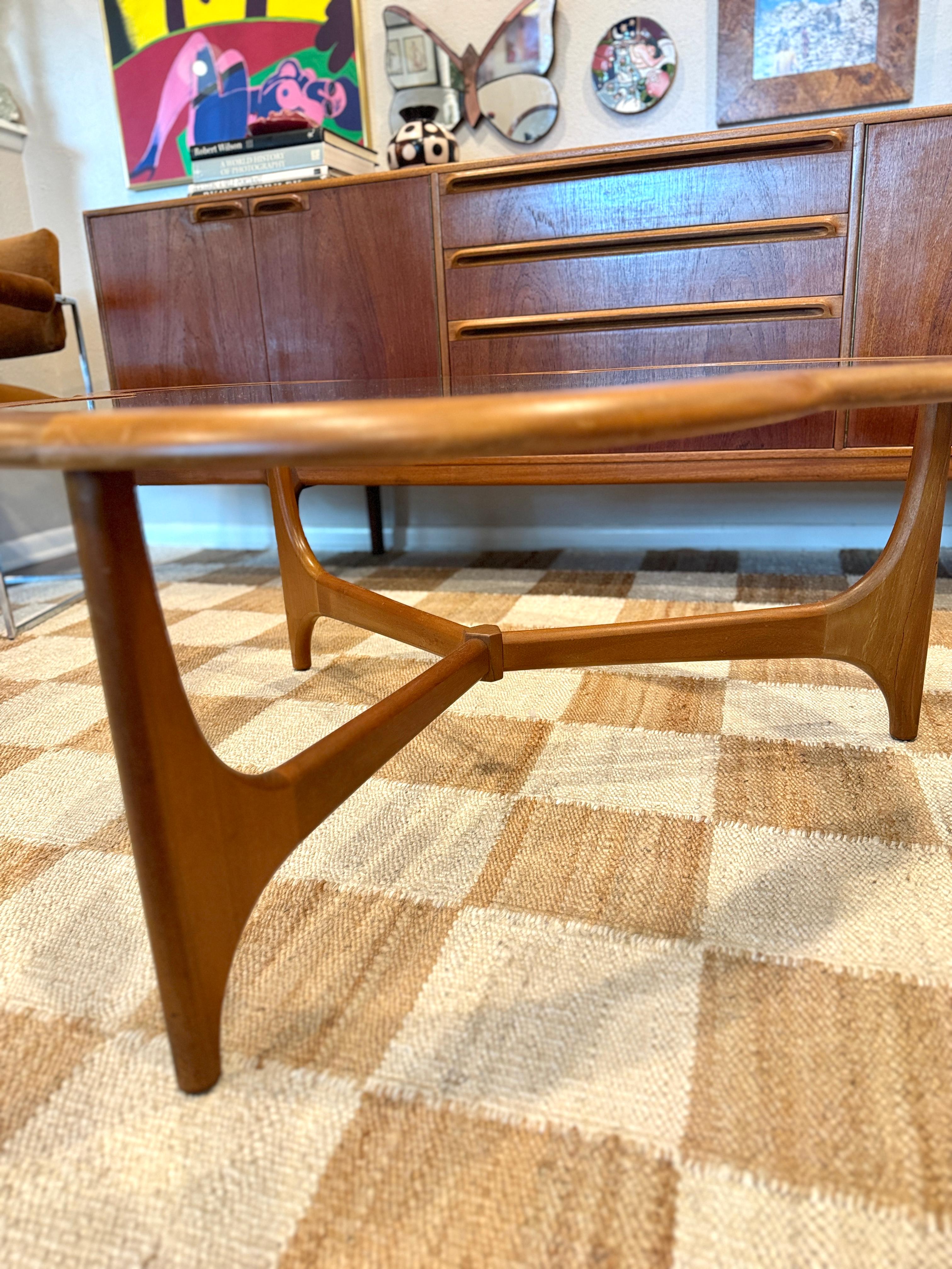 Teak A mid century modern 3 leaf clover coffee table from the Stonehill Stateroom