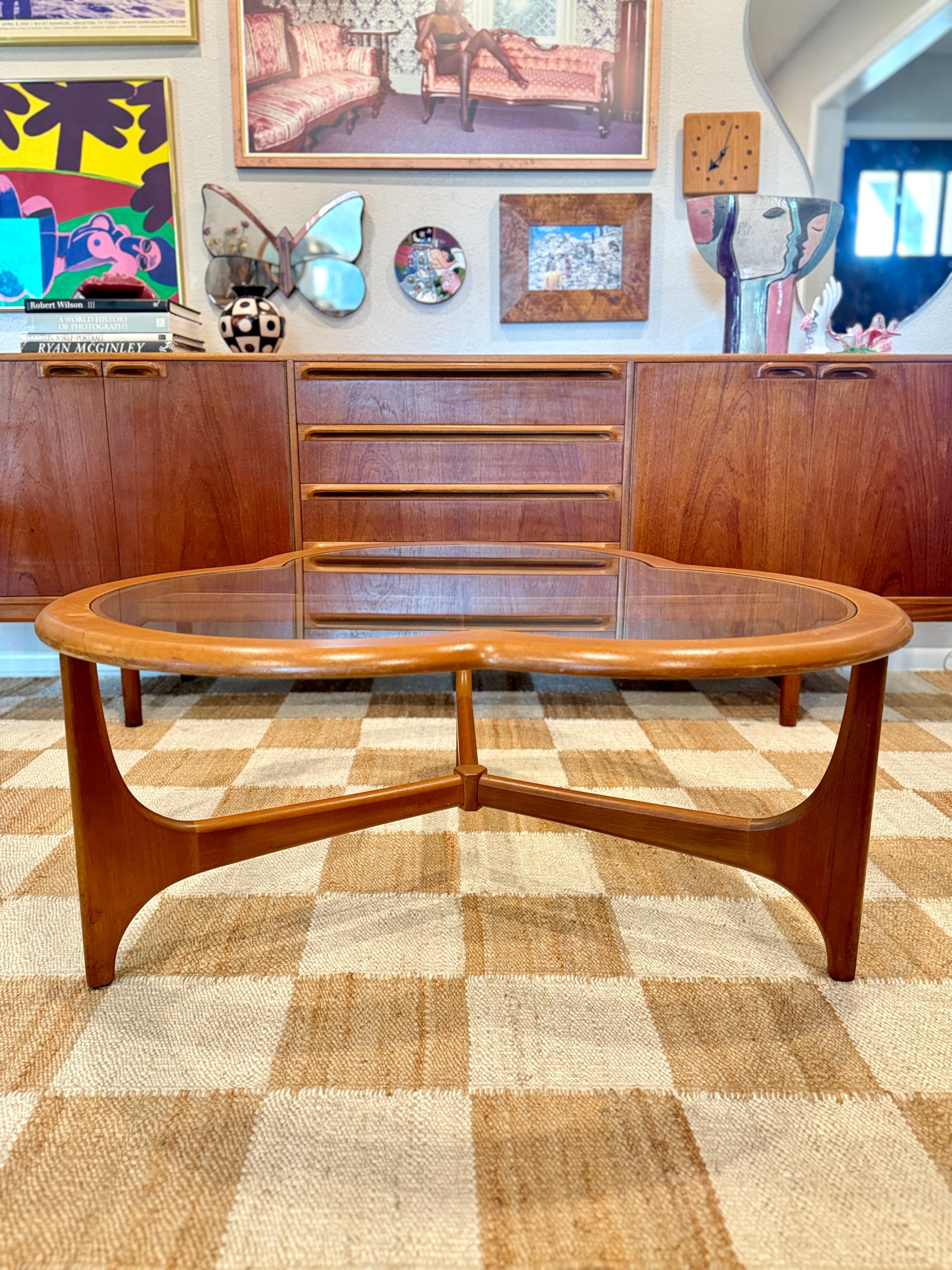 A mid century modern 3 leaf clover coffee table from the Stonehill Stateroom 2