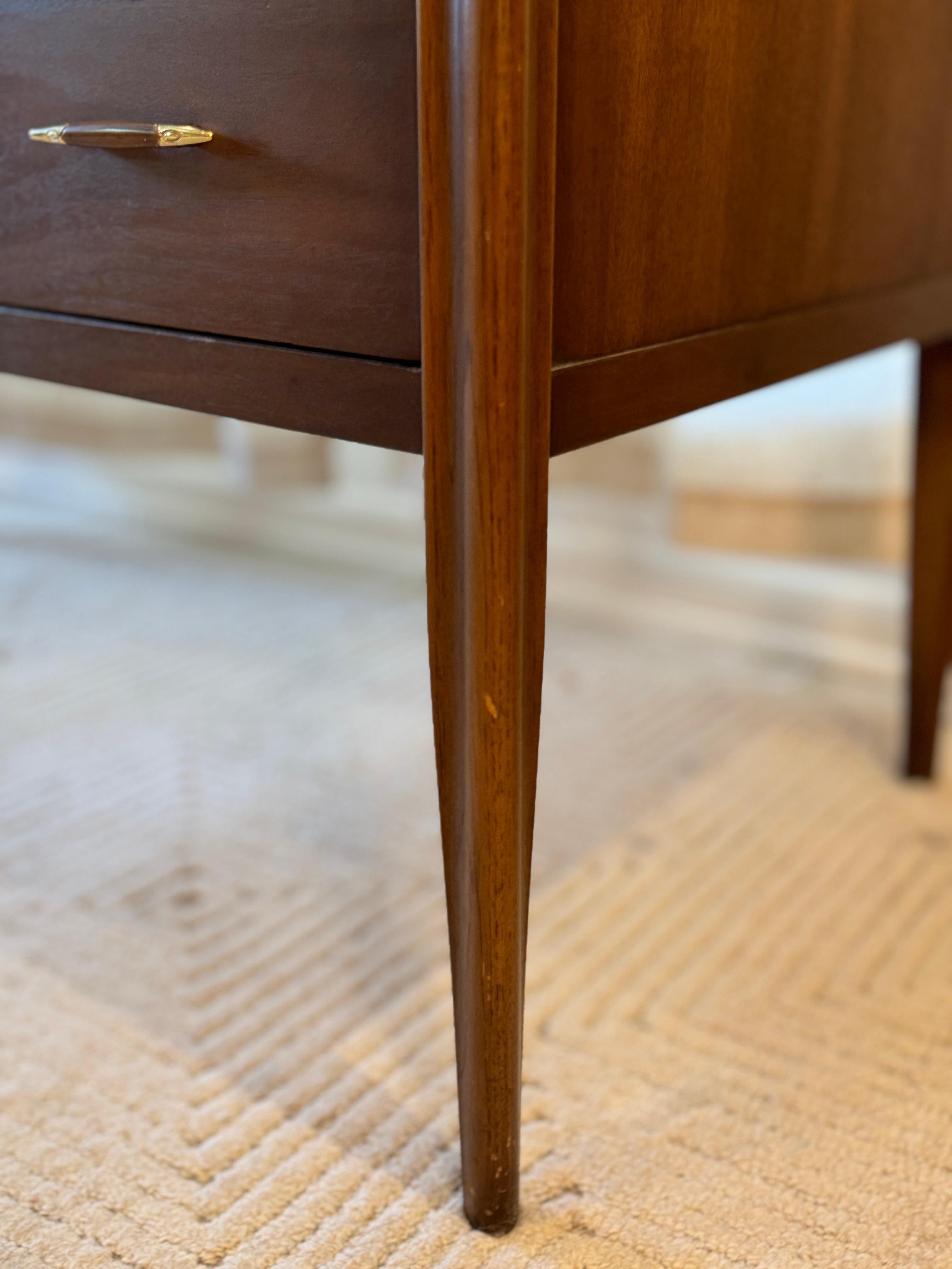 Mid-Century Modern A mid century modern American icon, the Saga desk by Broyhill
