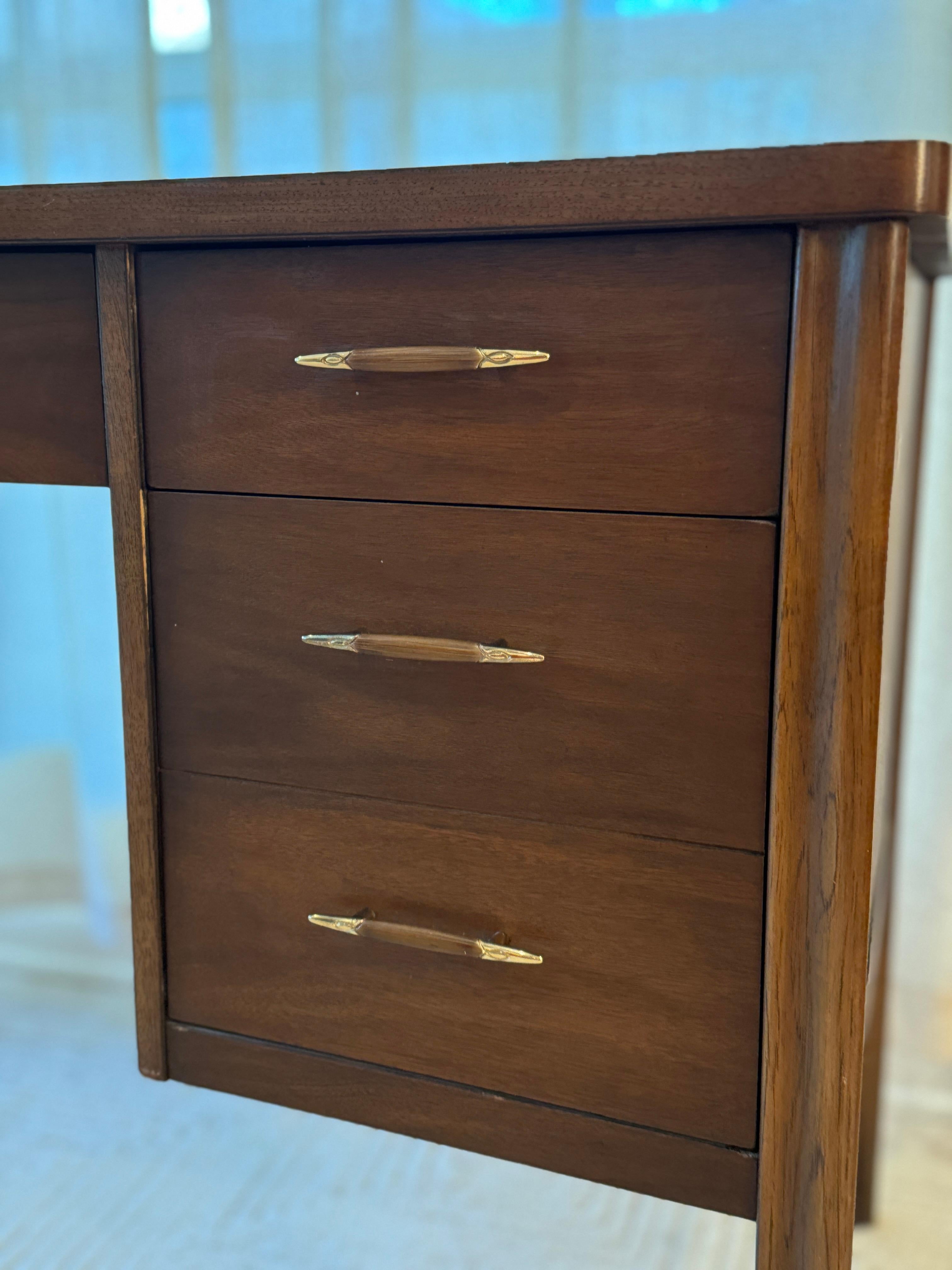 Wood A mid century modern American icon, the Saga desk by Broyhill