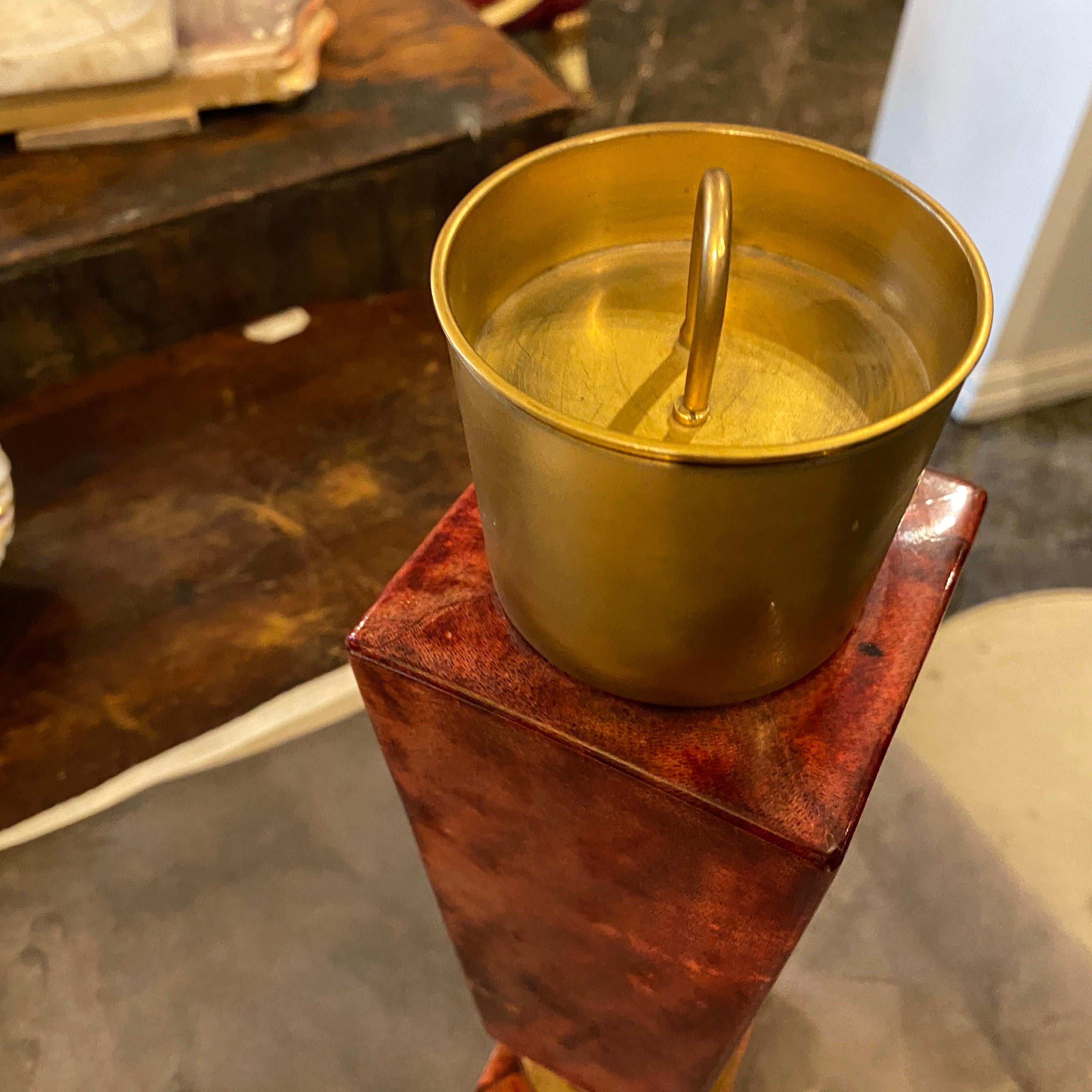 A Mid-Century Modern Italian Shaker designed and manufactured by Aldo Tura, red goatskin and brass are in original conditions, it's probably never used.