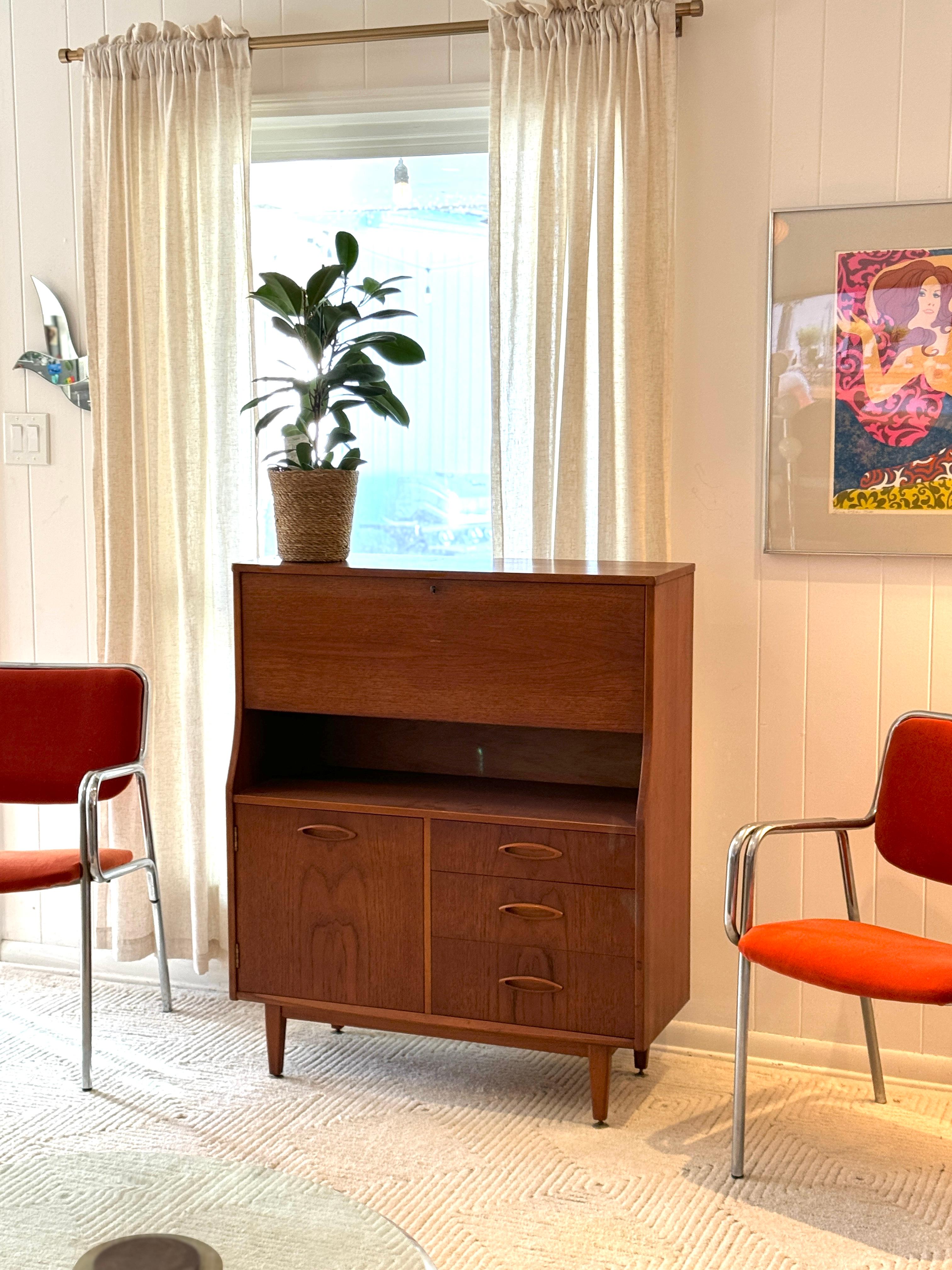 European A mid century modern cabinet with a drop front desk by Jentique furniture