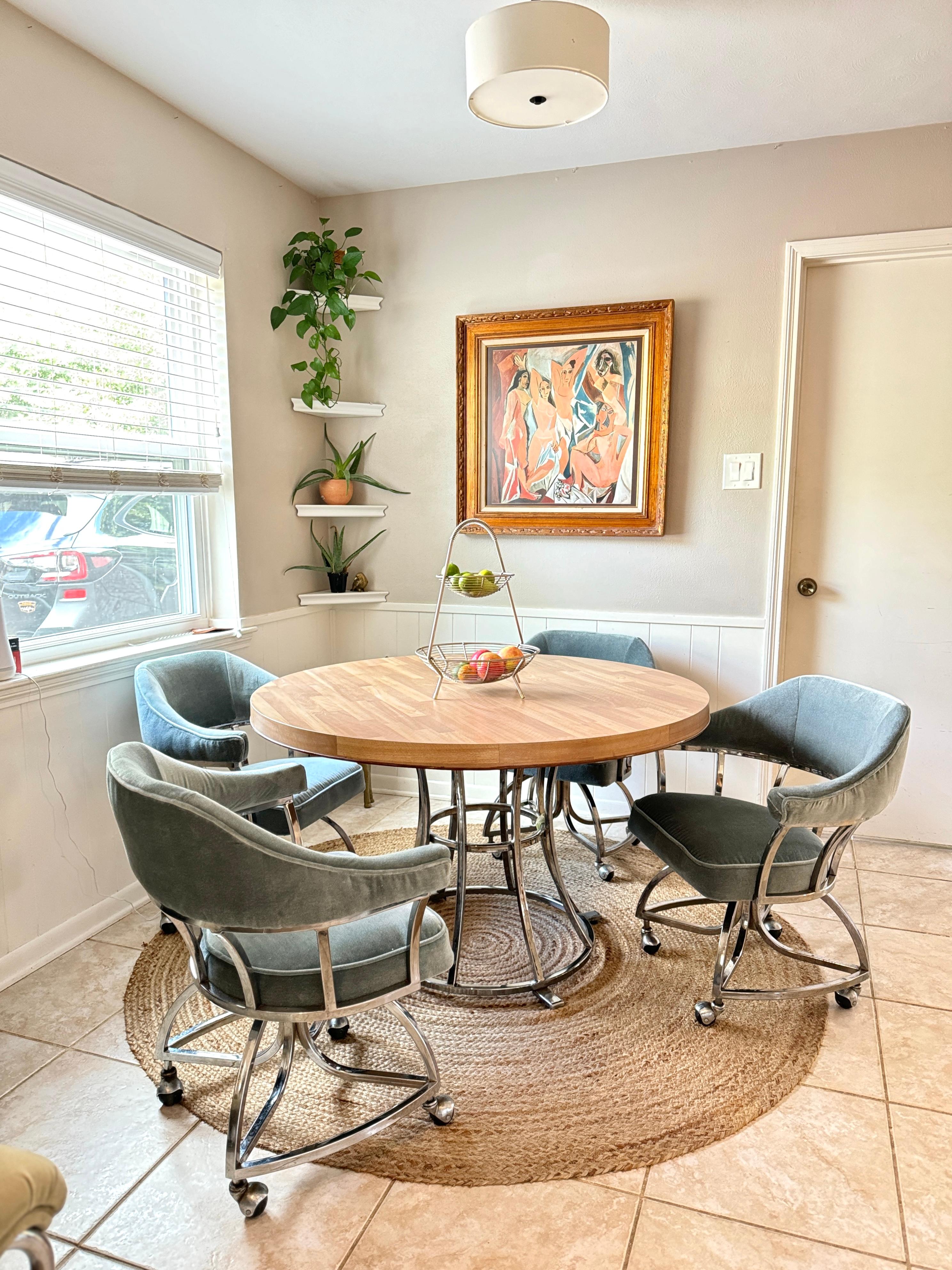 A mid century modern chrome dining set including 4 chairs and table 1970s In Good Condition In Houston, TX